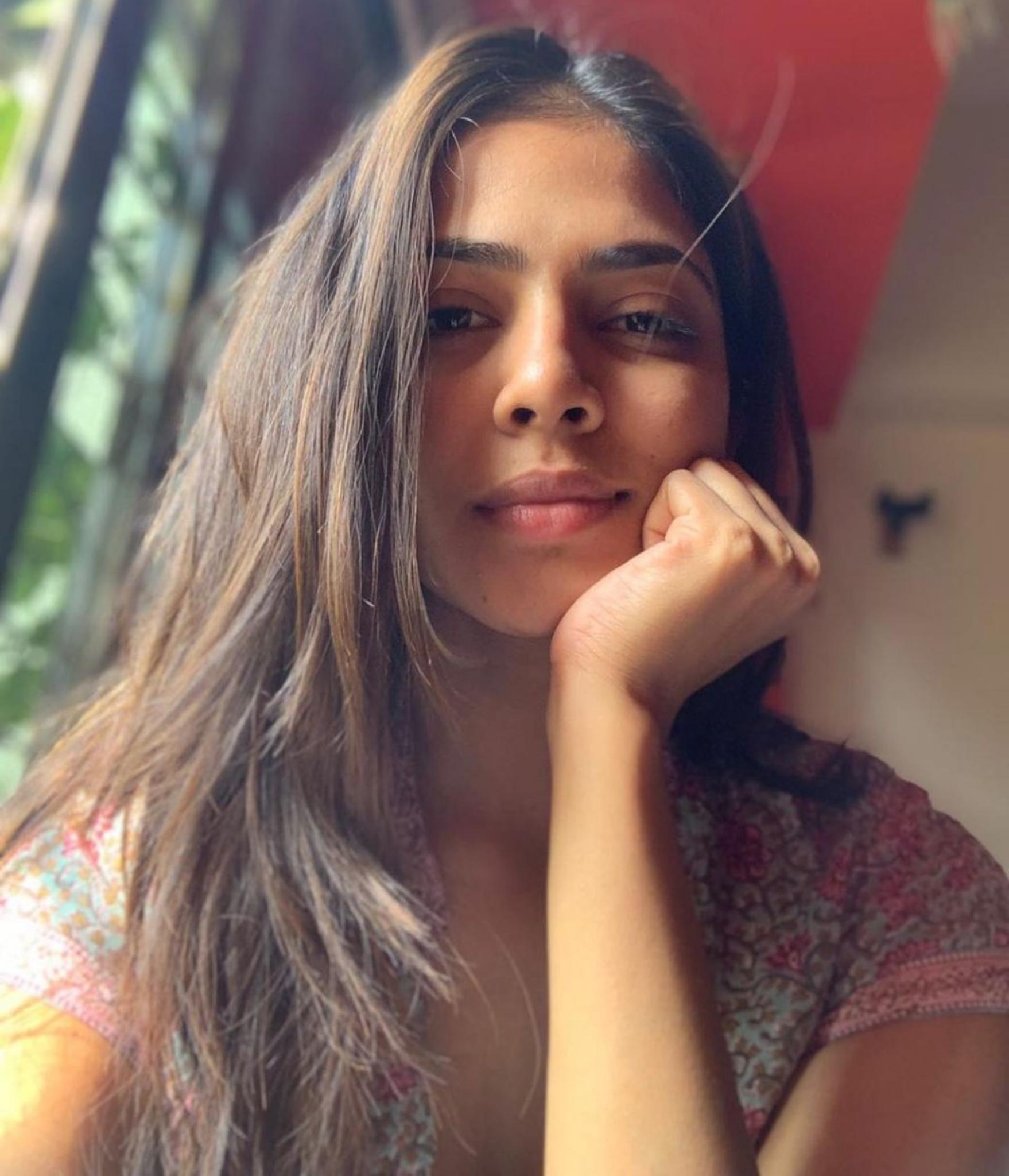 Malavika Mohanan Scrolller