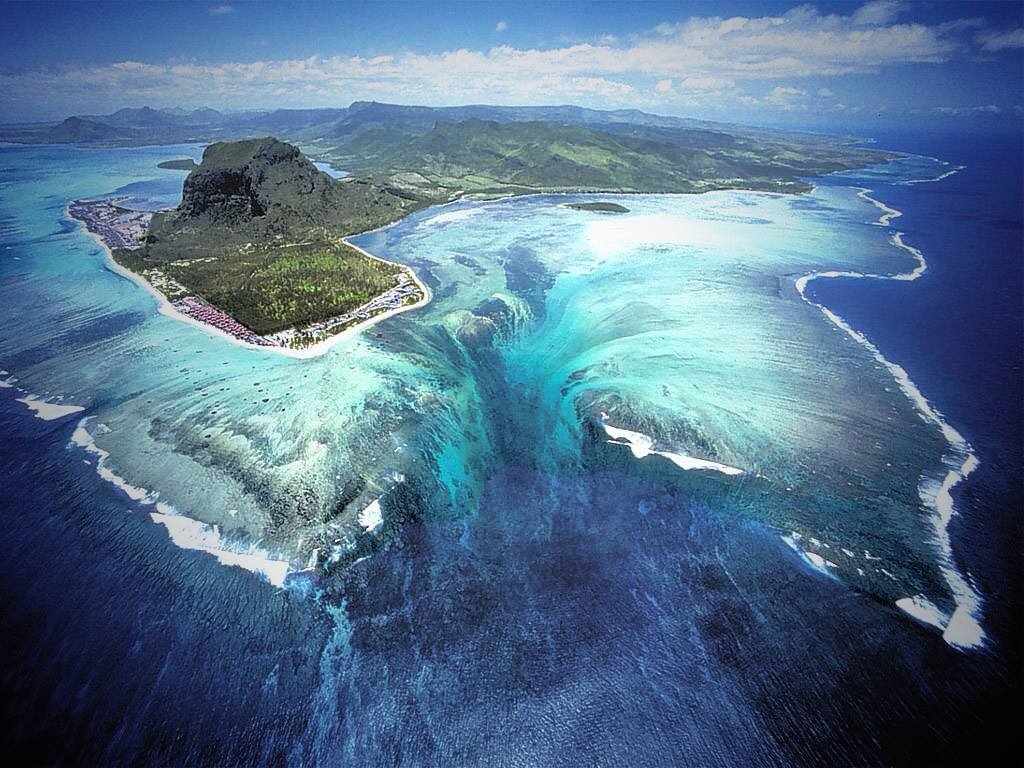 Aerial illusion of an underwater waterfall off of Mauritius Island ...