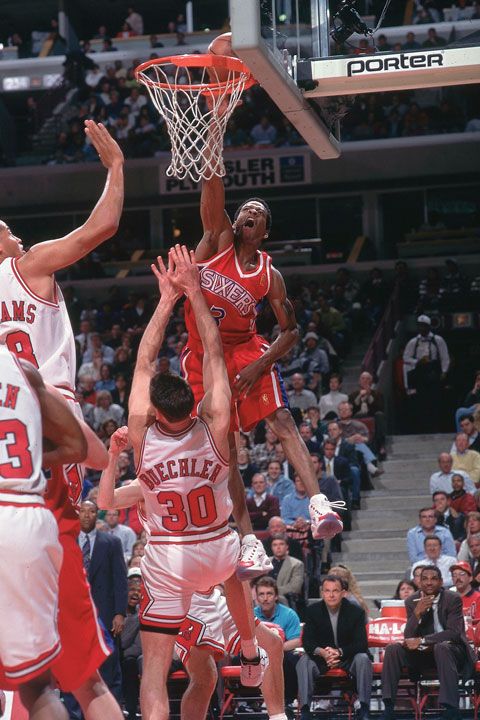 Allen Iverson dunks on Jud Buechler during a 1997 Bulls-Sixers game ...