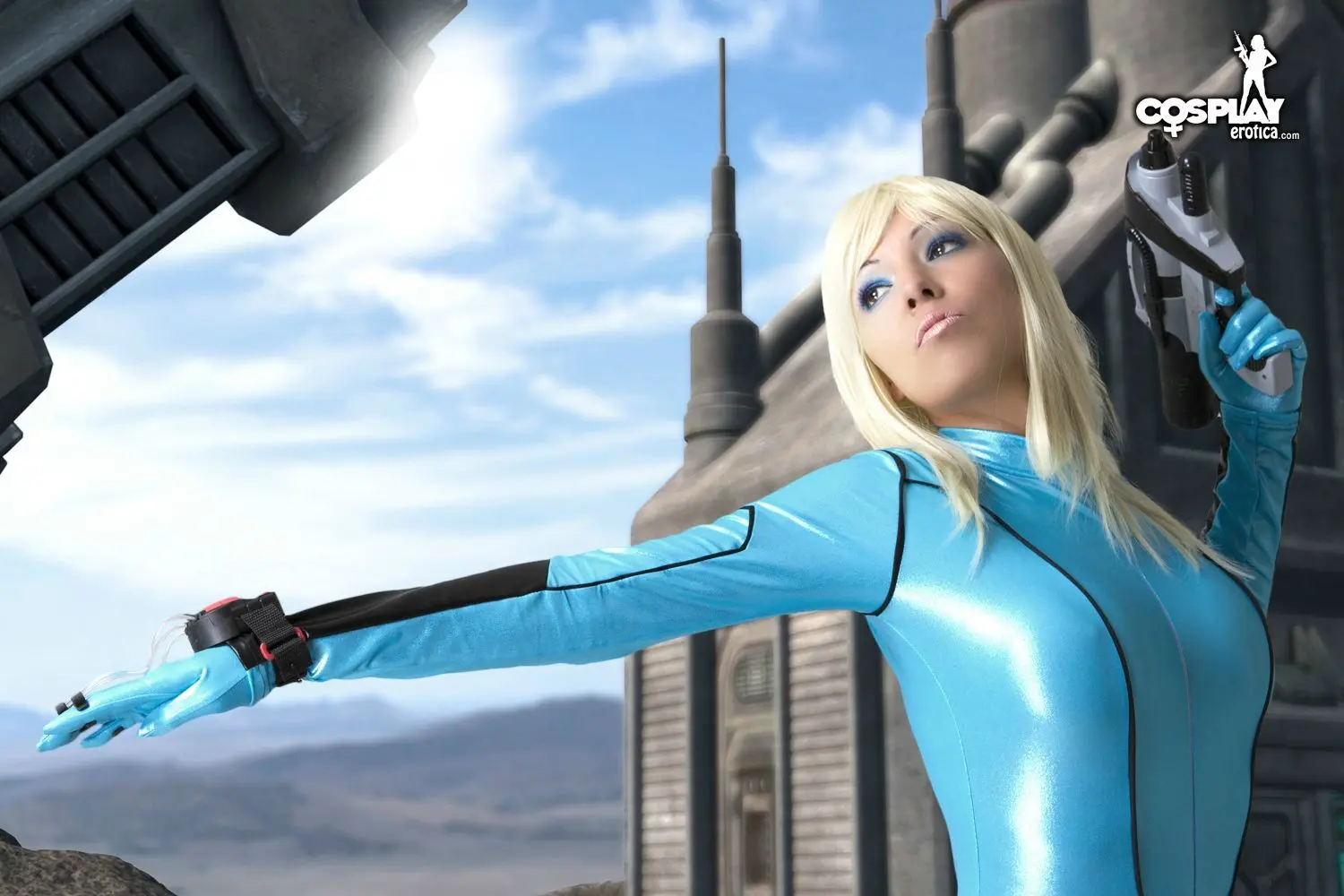 Mea Lee as Samus Aran from Metroid in a shiny blue bodysuit and black boots