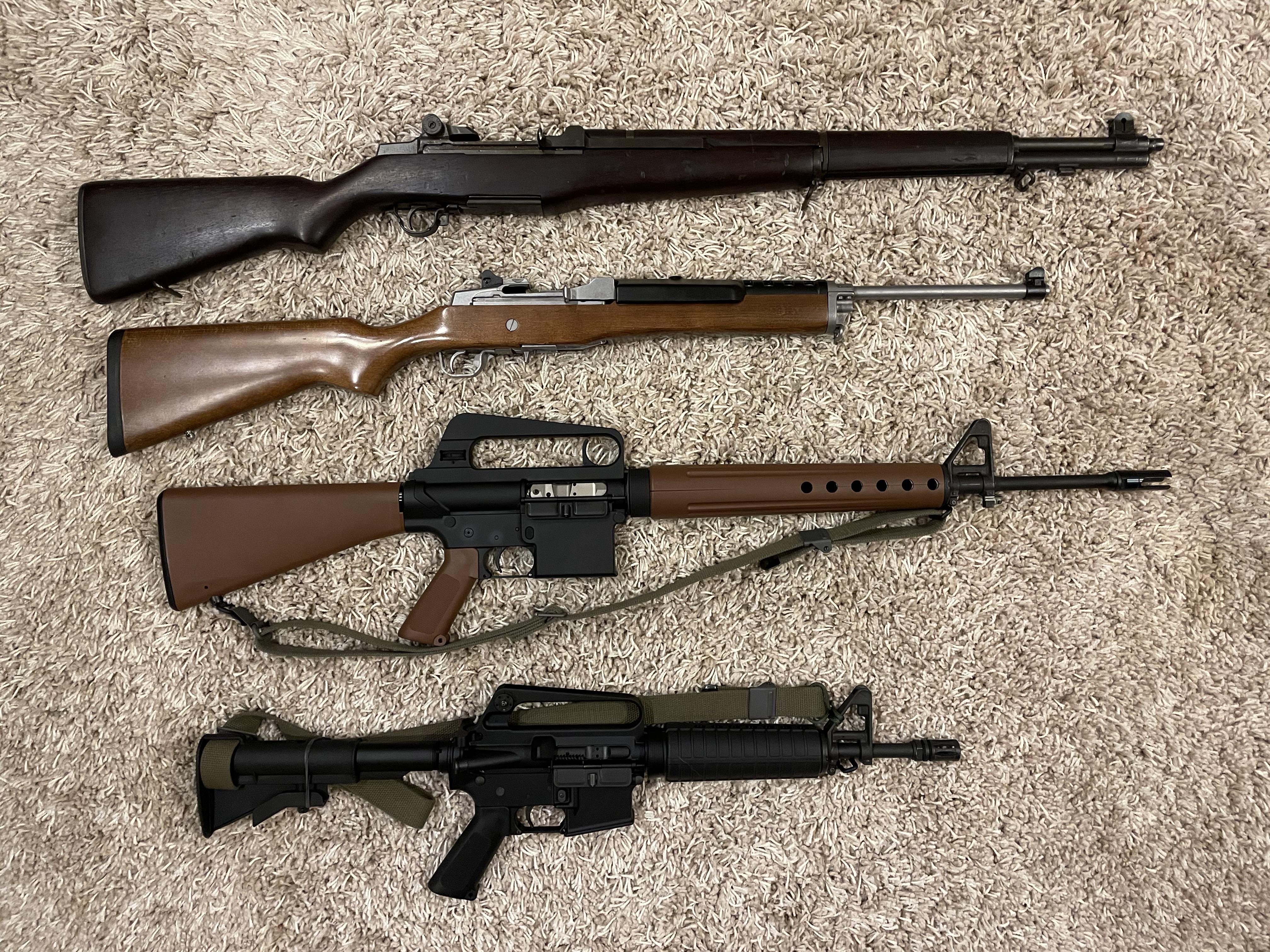 Battle rifles with models for scale. | Scrolller