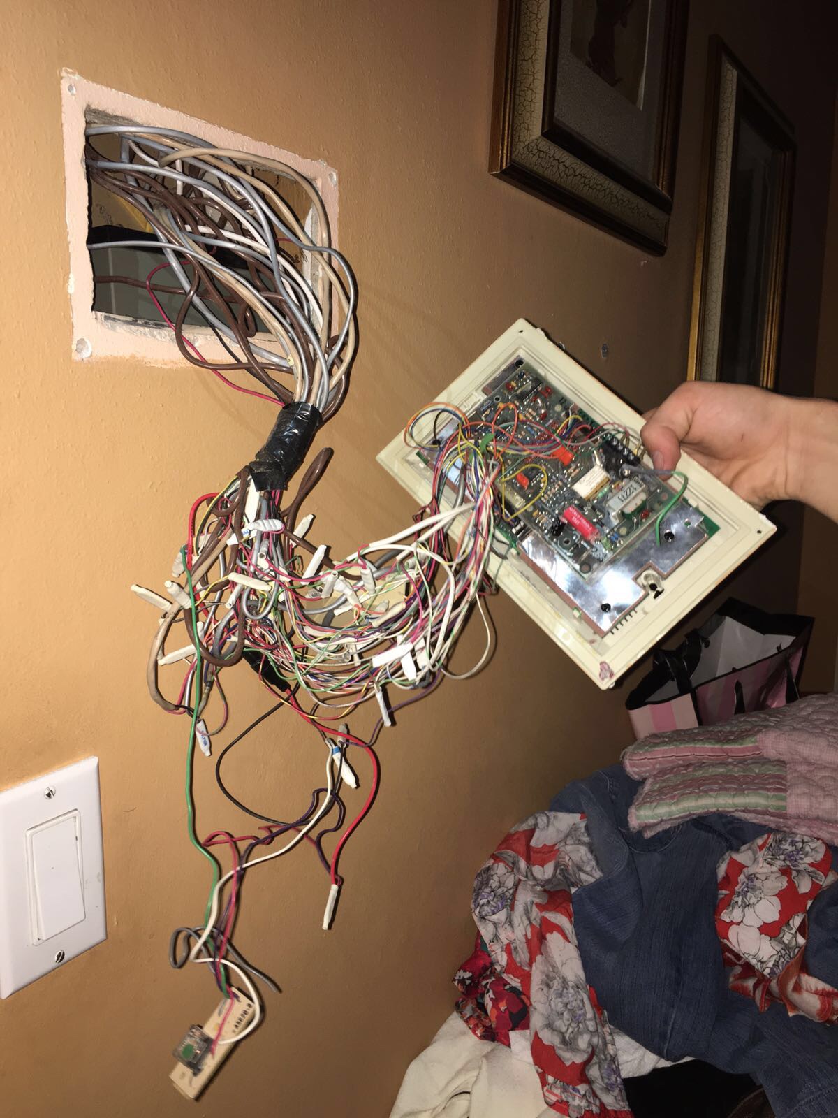 Behind an old alarm system keypad. Scrolller