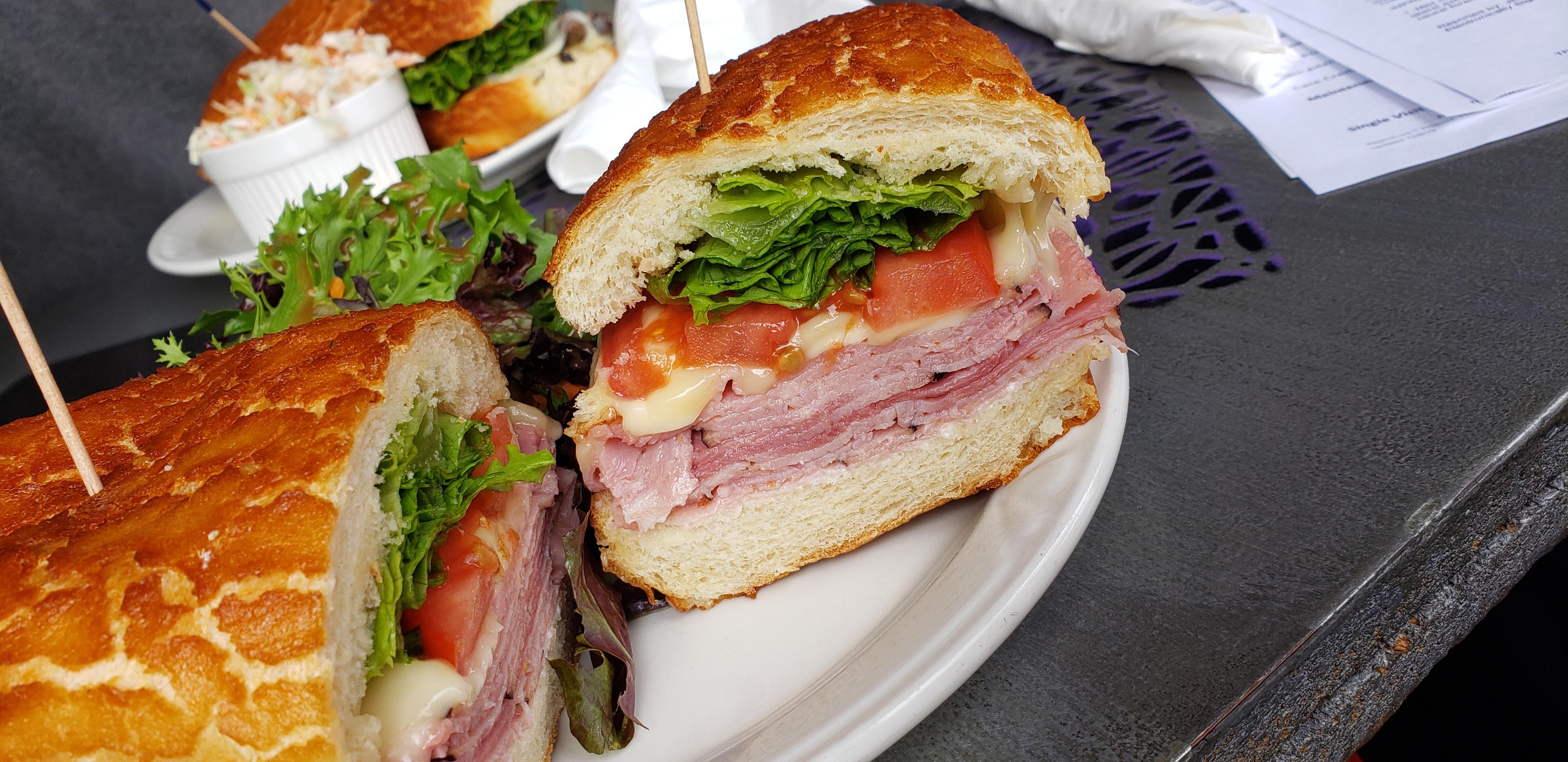 Black forest ham and brie on dutch crunch roll. From Printer's Cafe in