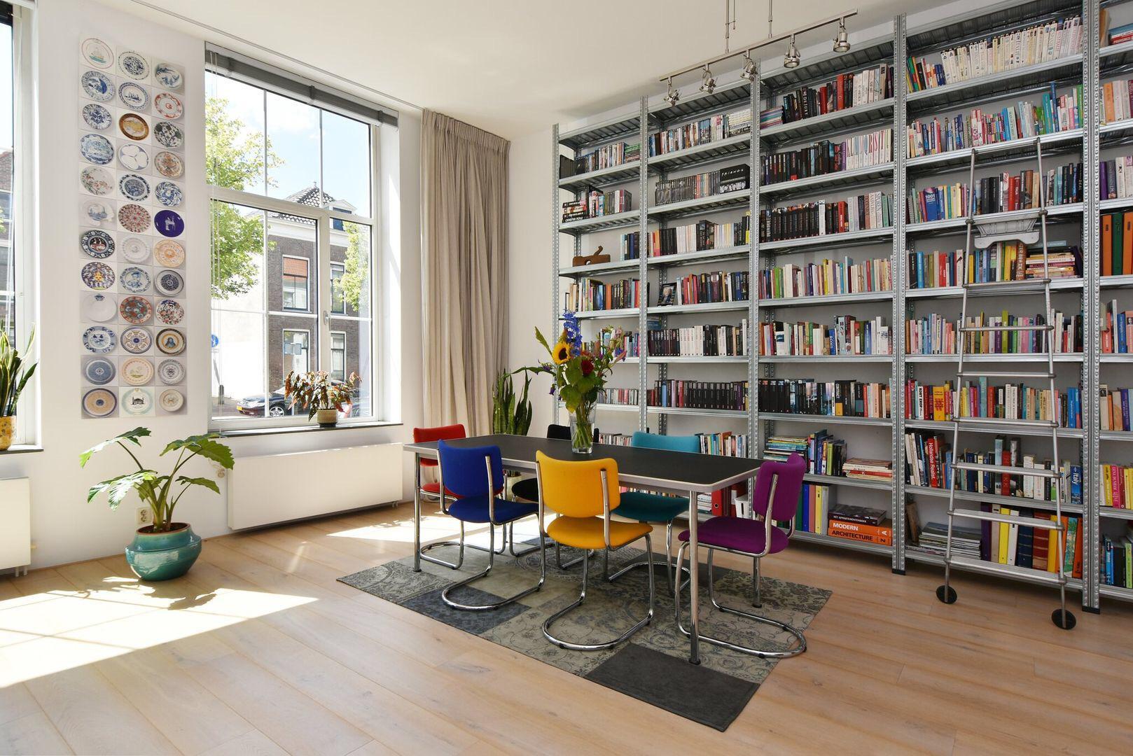 Bookshelf in a canalhouse in Delft, the Netherlands Scrolller