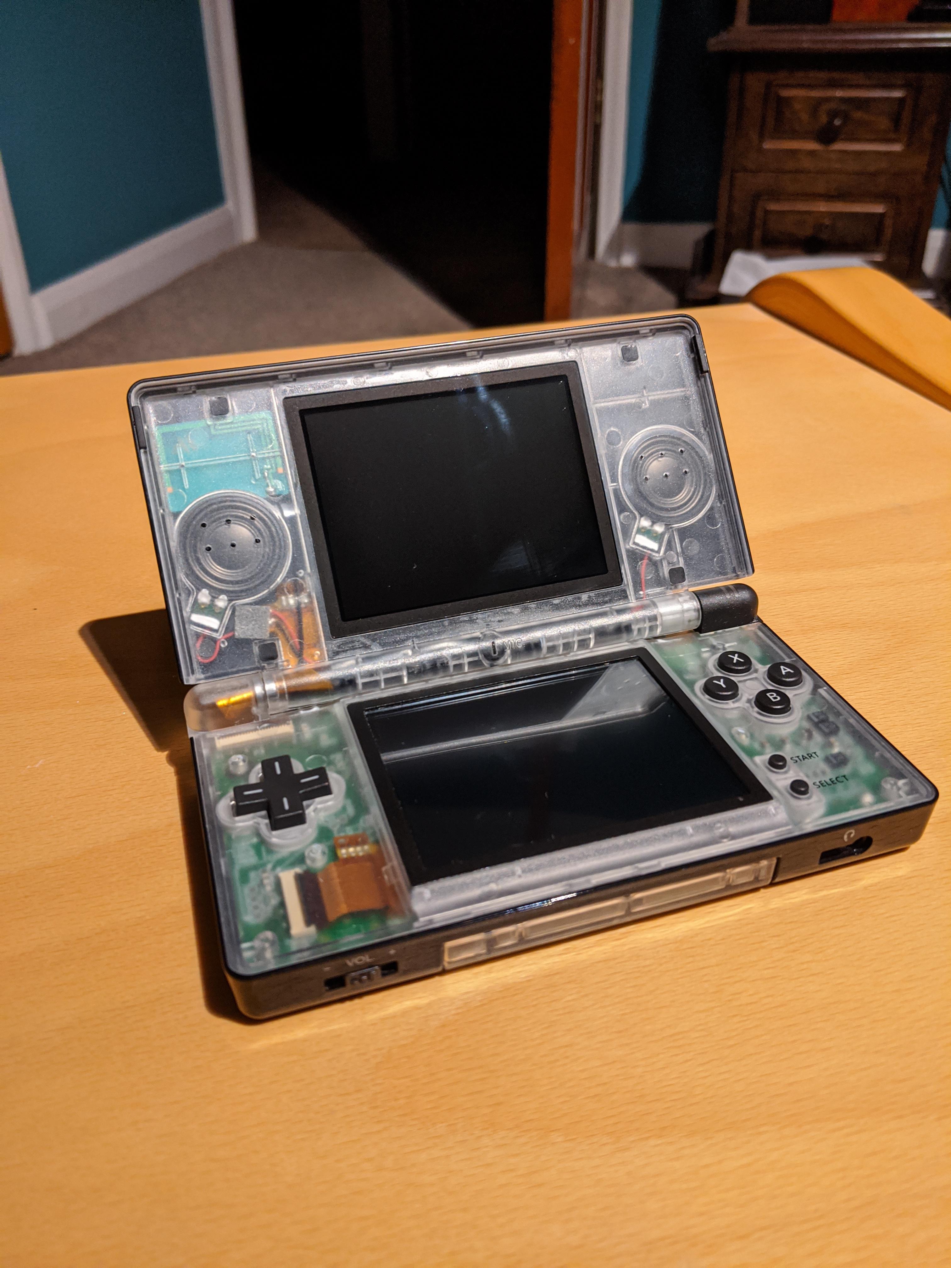 Clear & black DS Lite shell mod. It didn't feel right to have it all ...