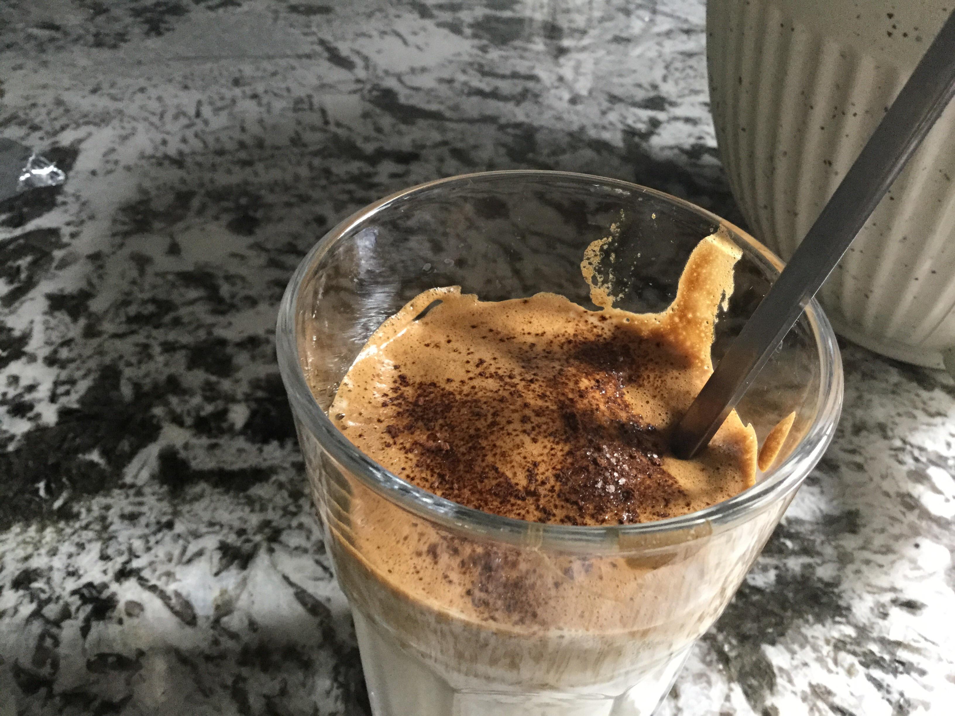 Dalgona coffee with cocoa powder on top Scrolller