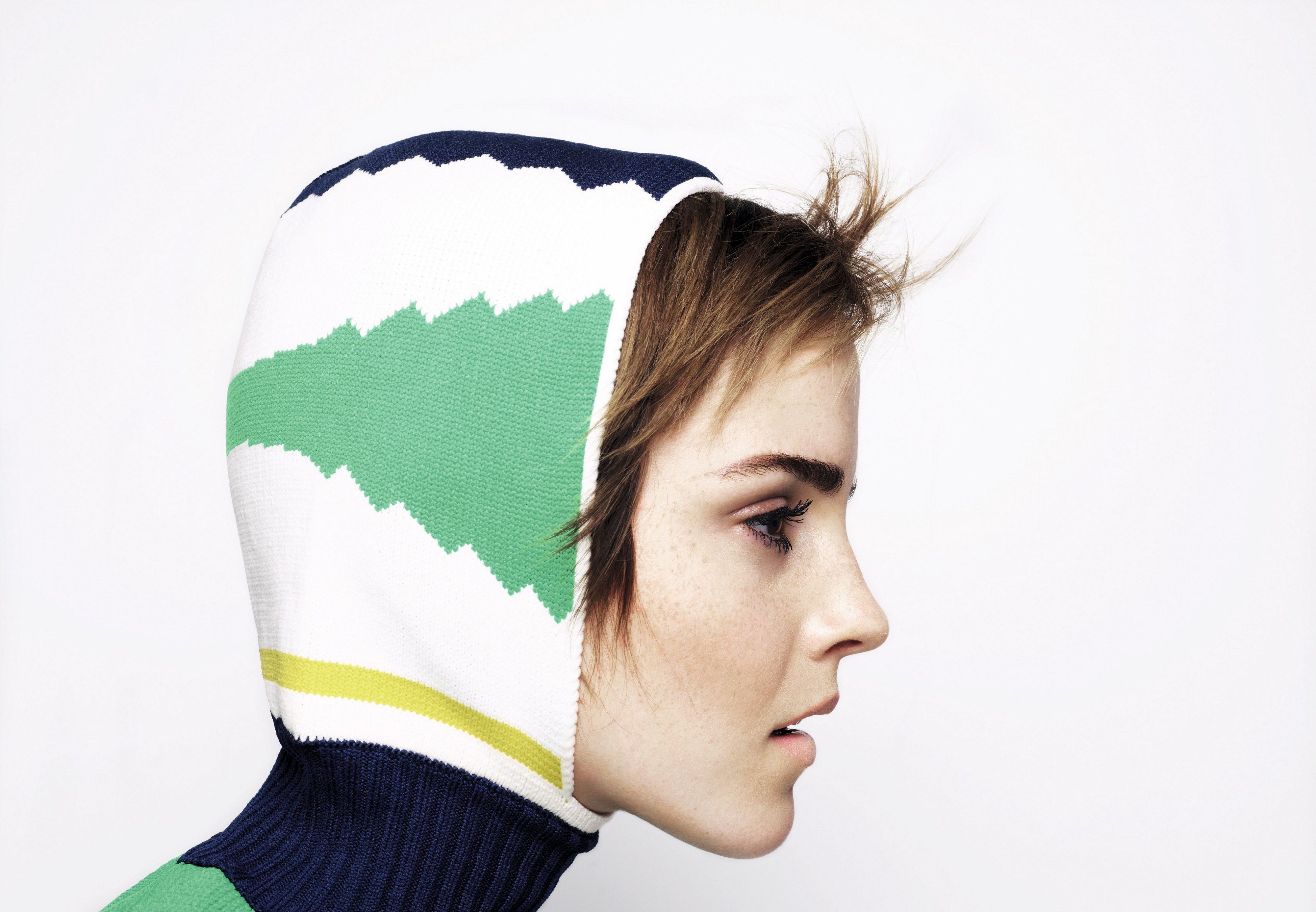 Emma Watson keeping her ears warm. | Scrolller