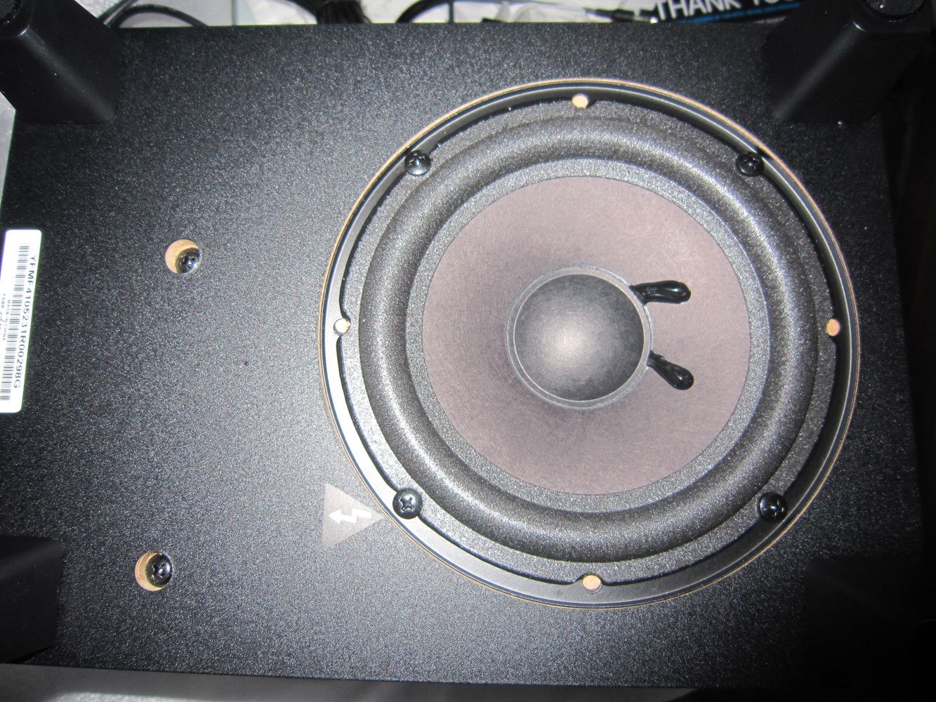 Epoxy / resin / glue on Subwoofer cone normal? Scrolller