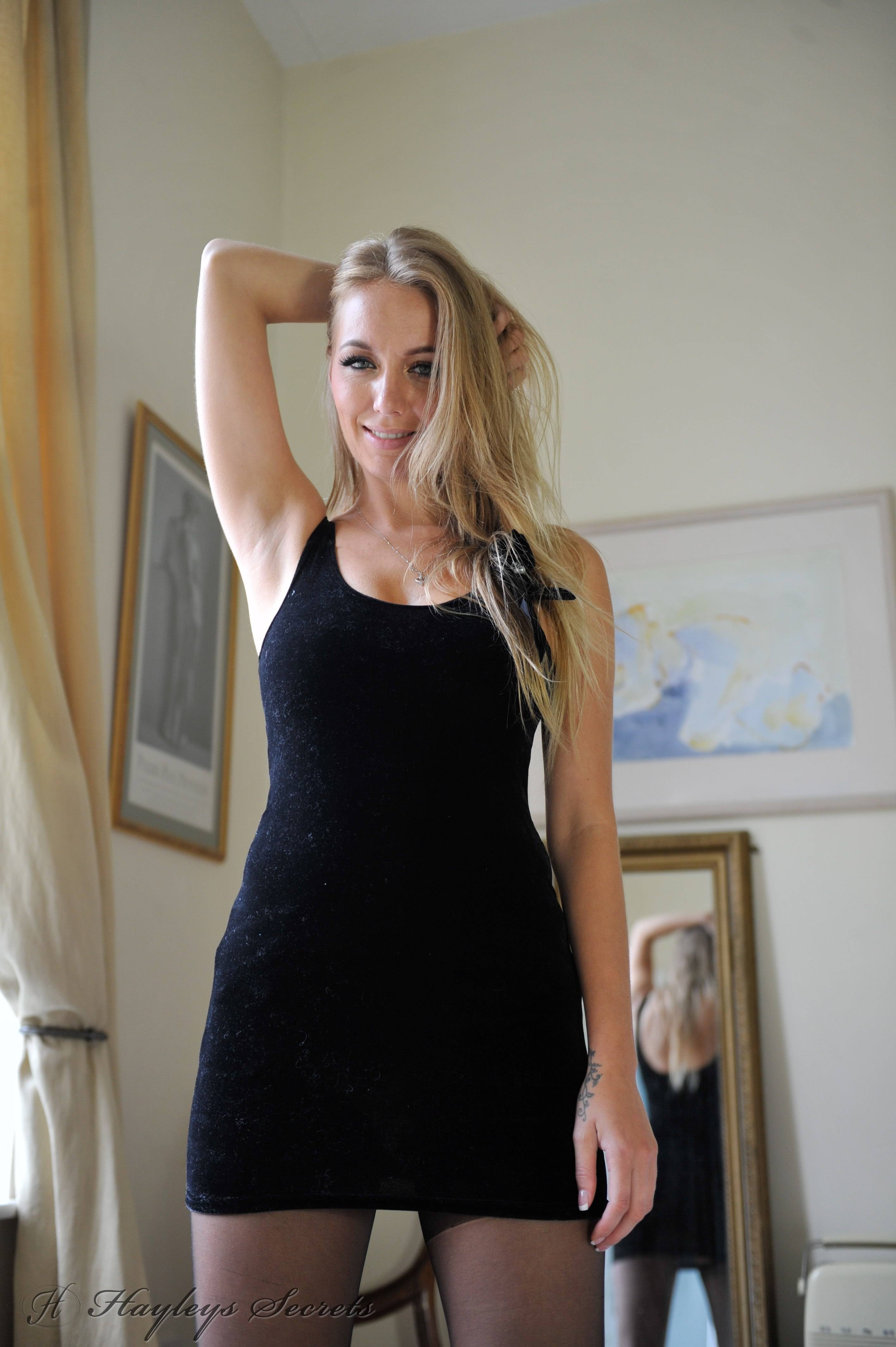 Hayley Marie Coppin in a black dress | Scrolller