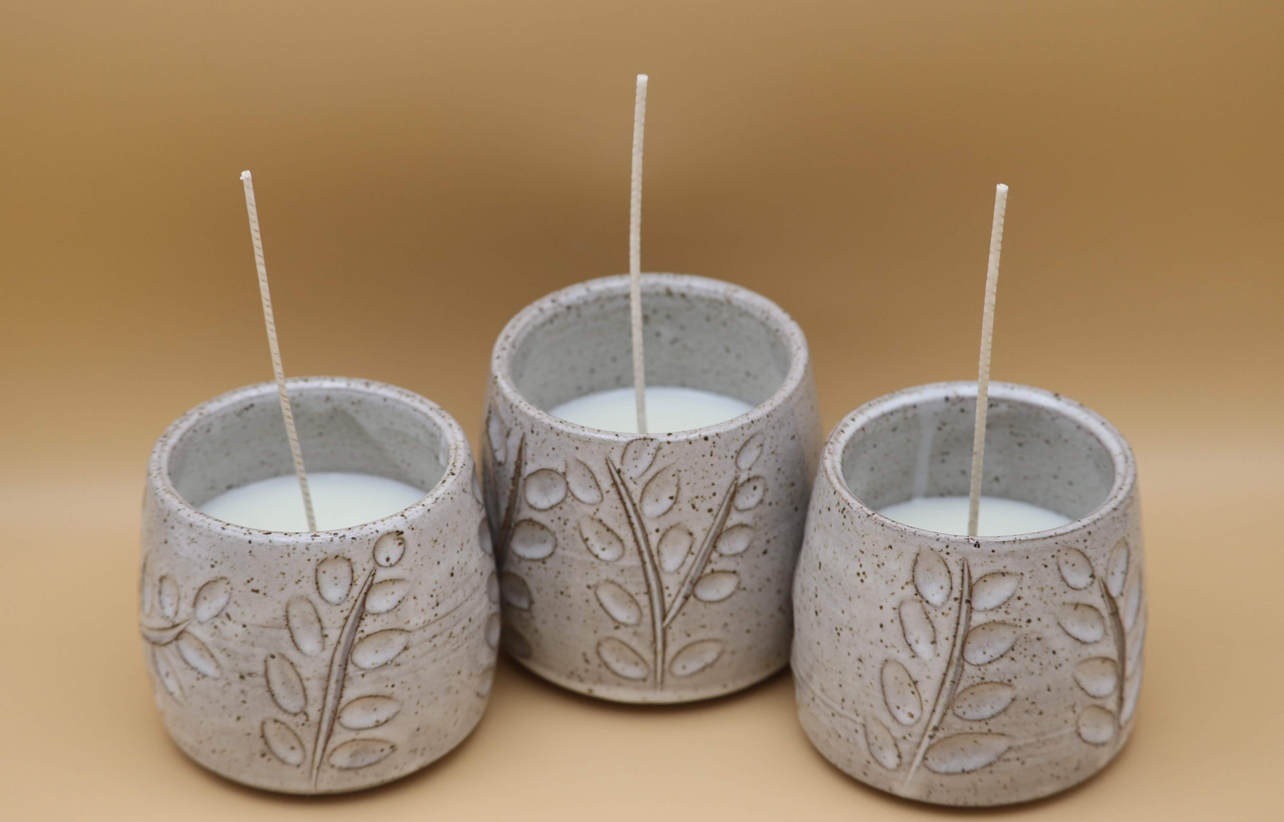 Homemade candles in handmade vessels Scrolller