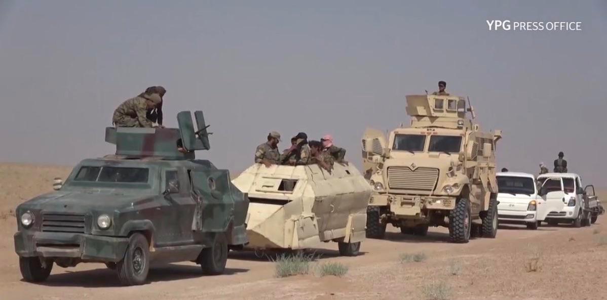 Homemade YPG armored car alongside a captured Daesh armored troop ...