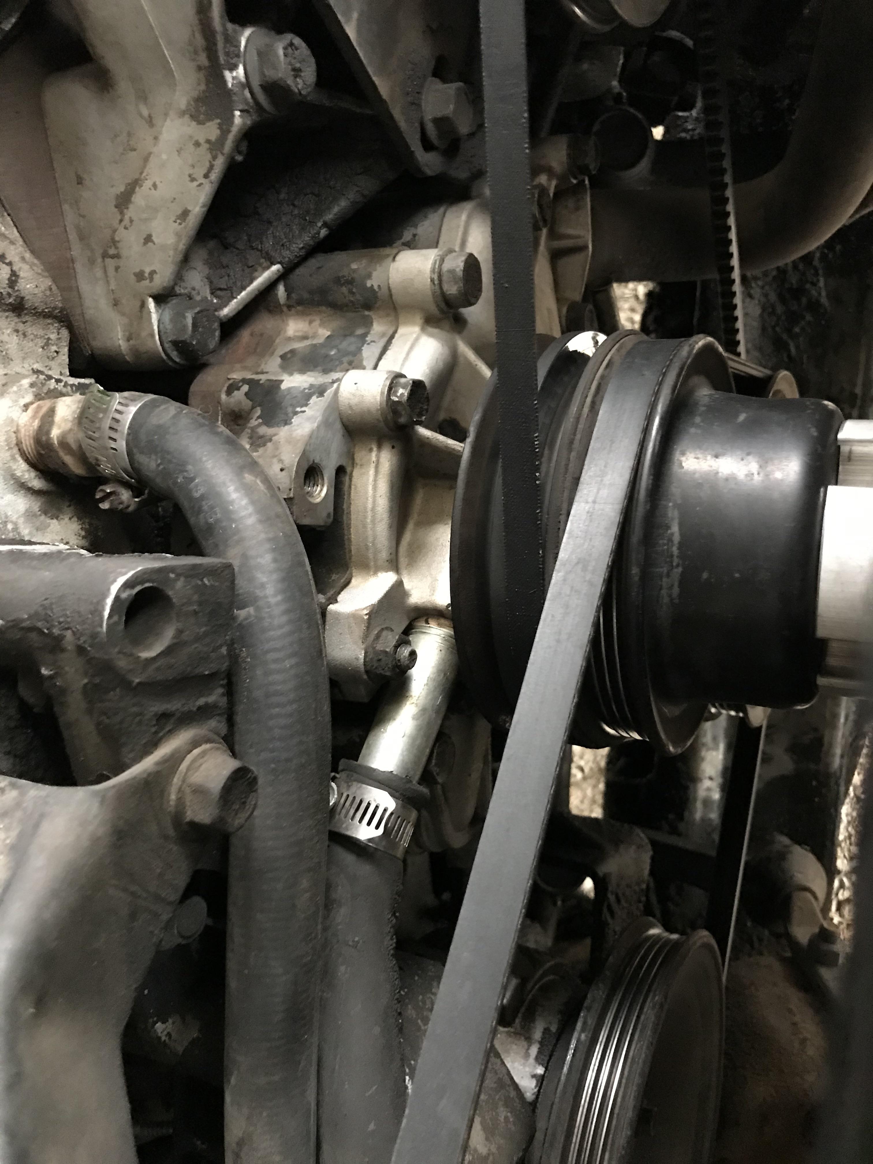 How does coolant flow through the 2 hoses in the picture below? The