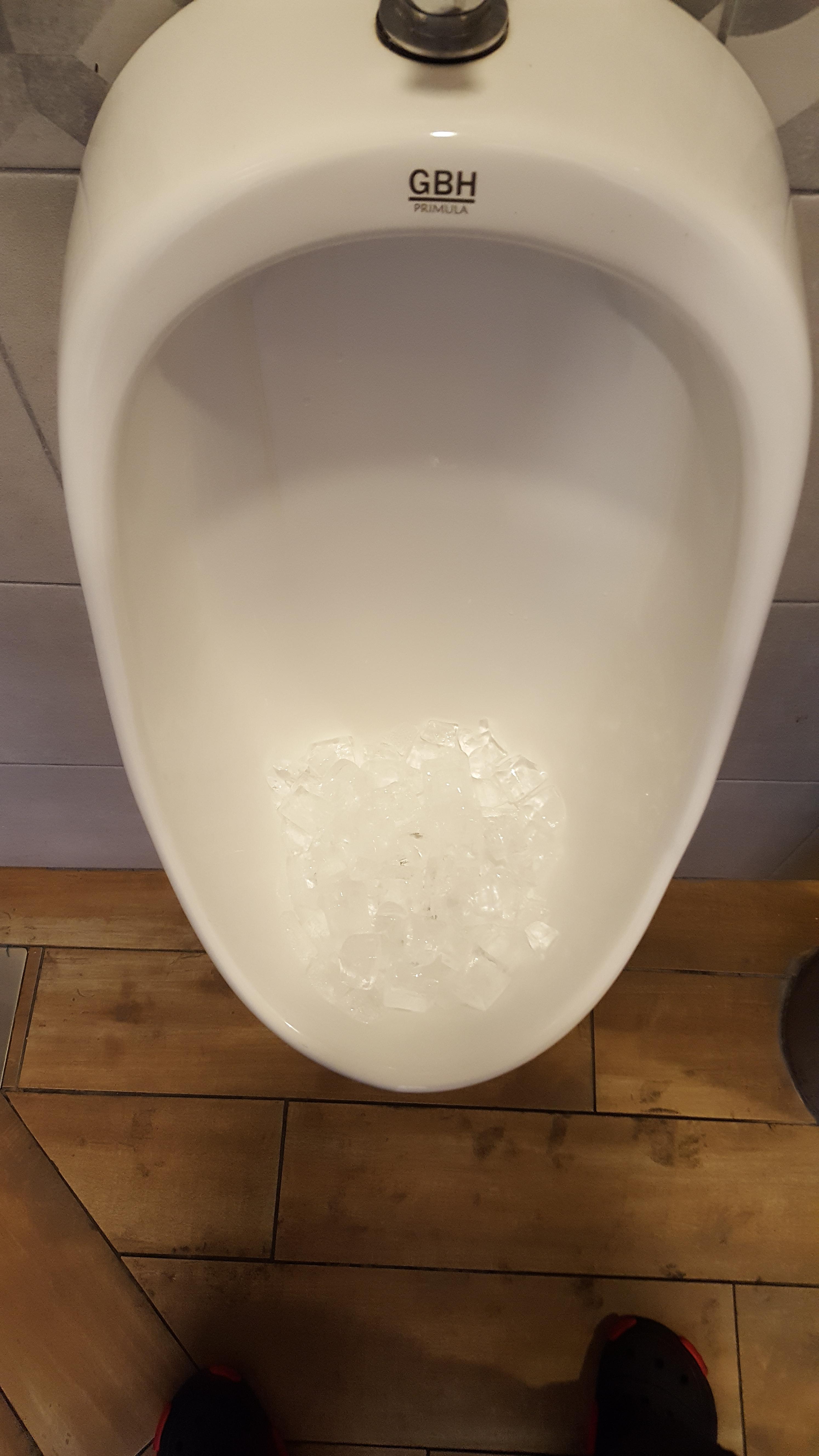 Ice in urinal - does it help? | Scrolller
