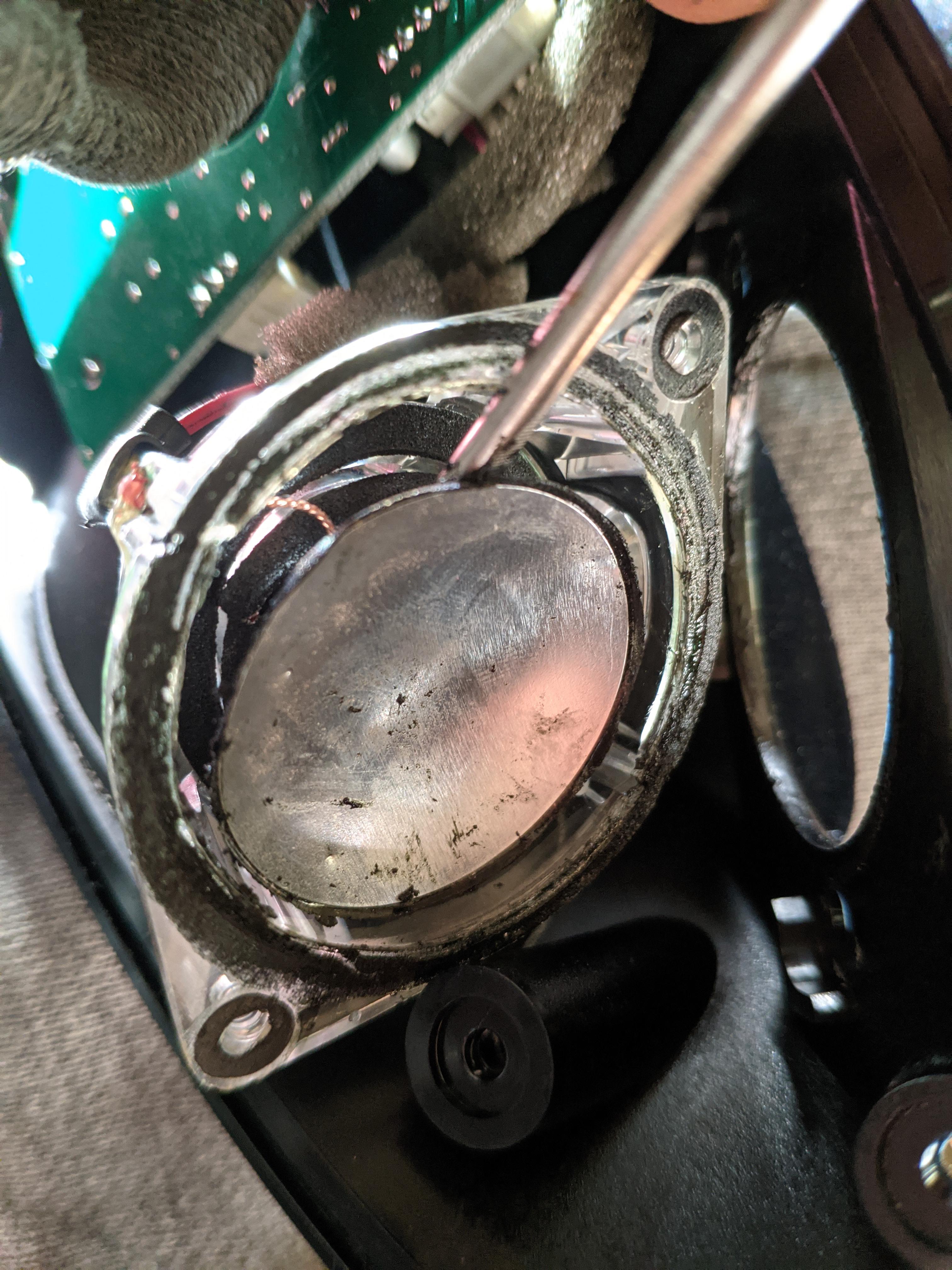 Is there a way to fix this speakers membrane? It's rotten and thus