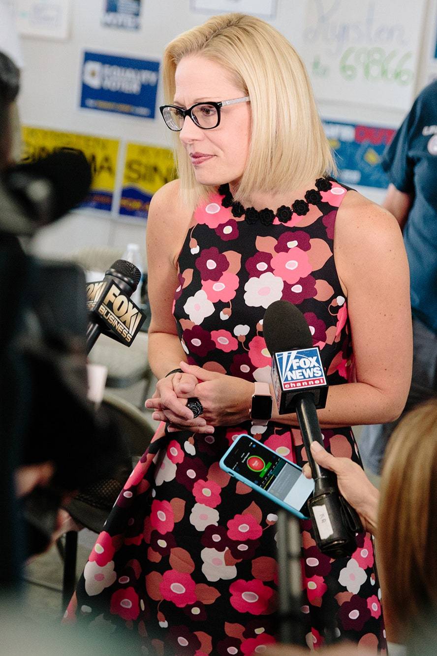 Kyrsten Sinema Scrolller