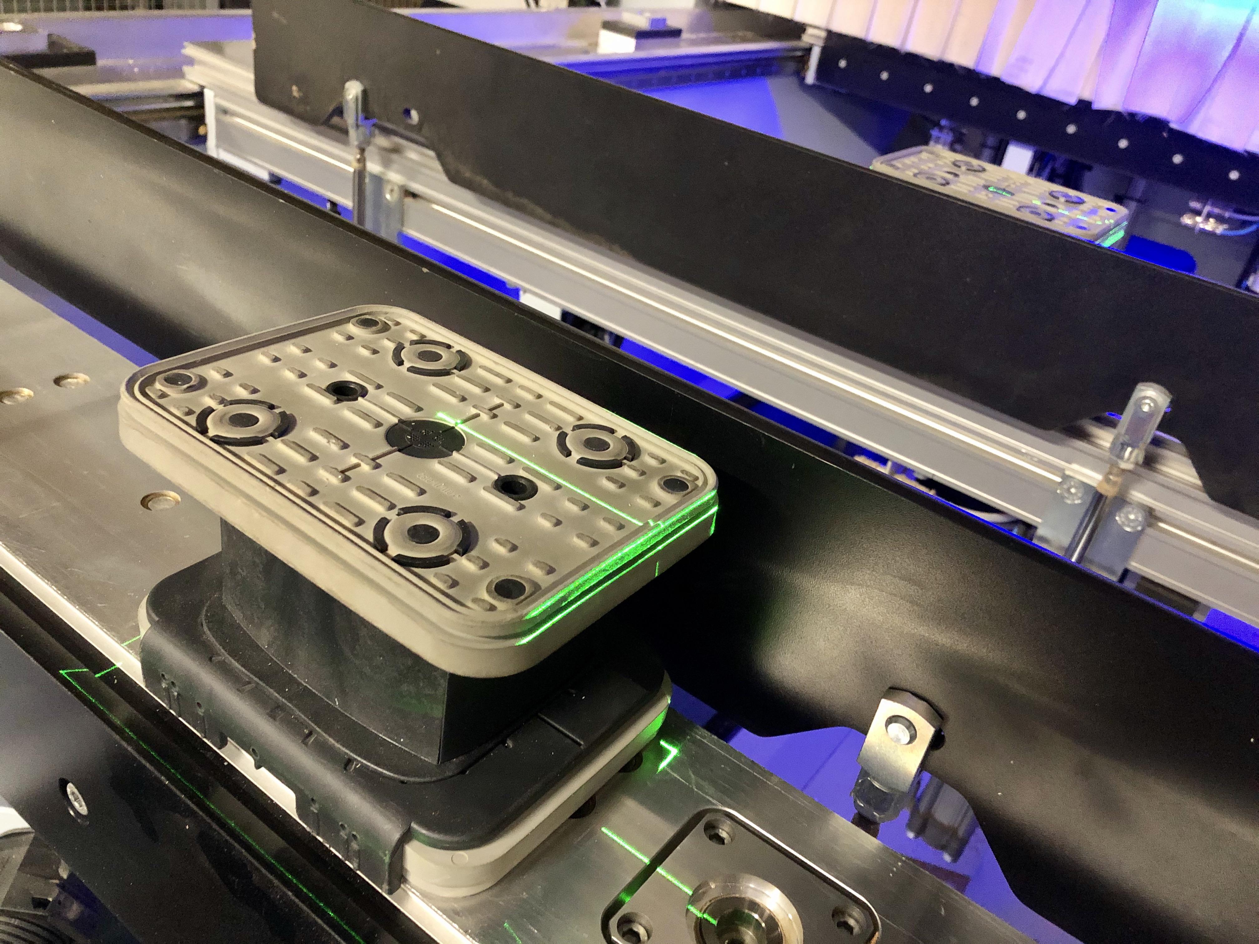 Laser-assisted positioning of suction cups on our Homag 5-axis router ...