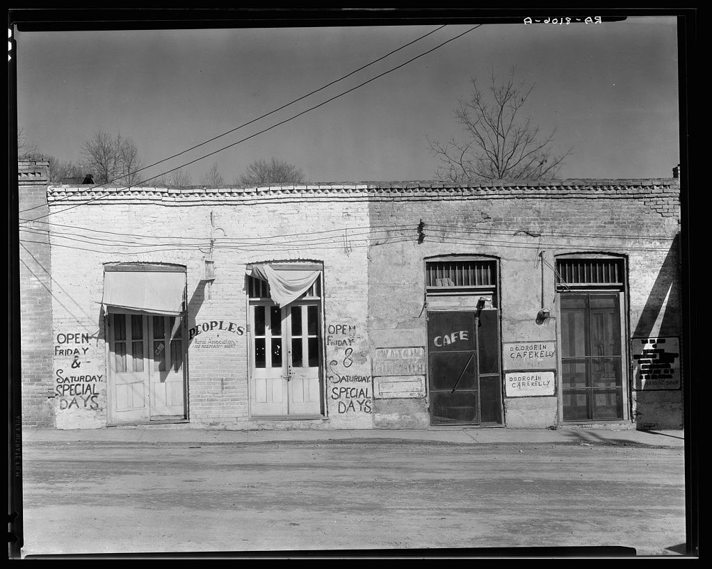Main street storefronts, Edwards, Mississippi, March 1936 by Walker
