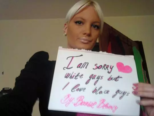 Mixed raceplay body writing and signs featuring Black and white women from JesusRaves