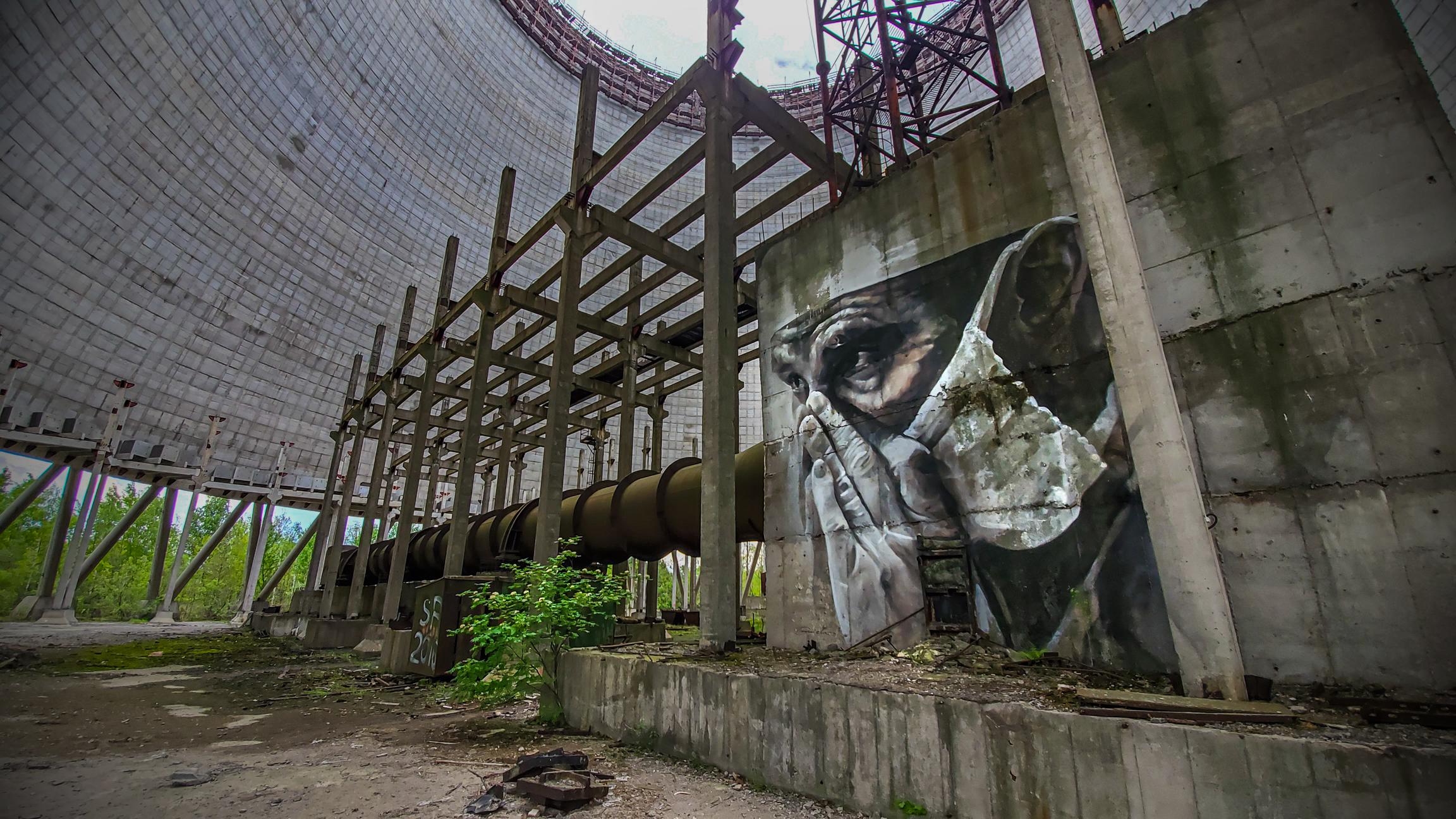 Mural of a doctor/first responder painted inside an unfinished cooling ...