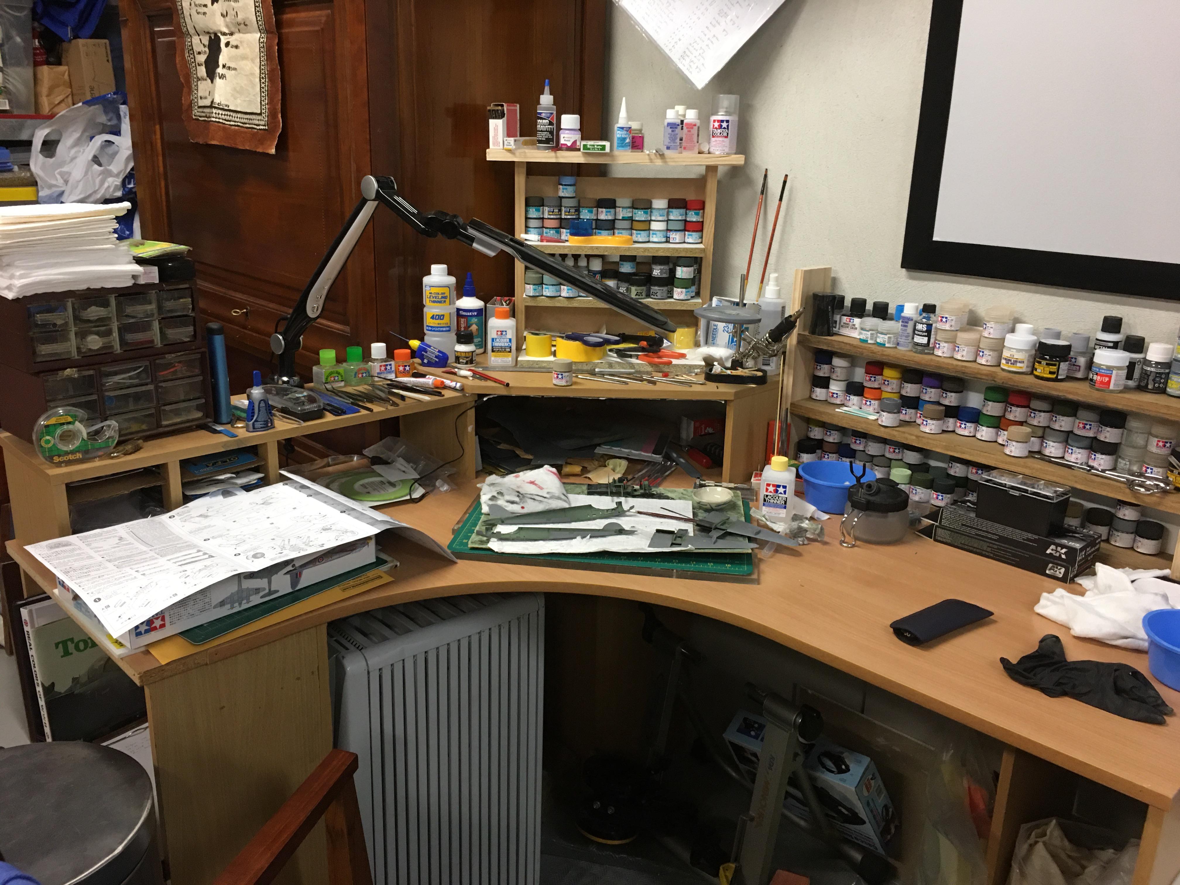 My dads model-making bench. Most of his paints,etc are Tamiya so I ...