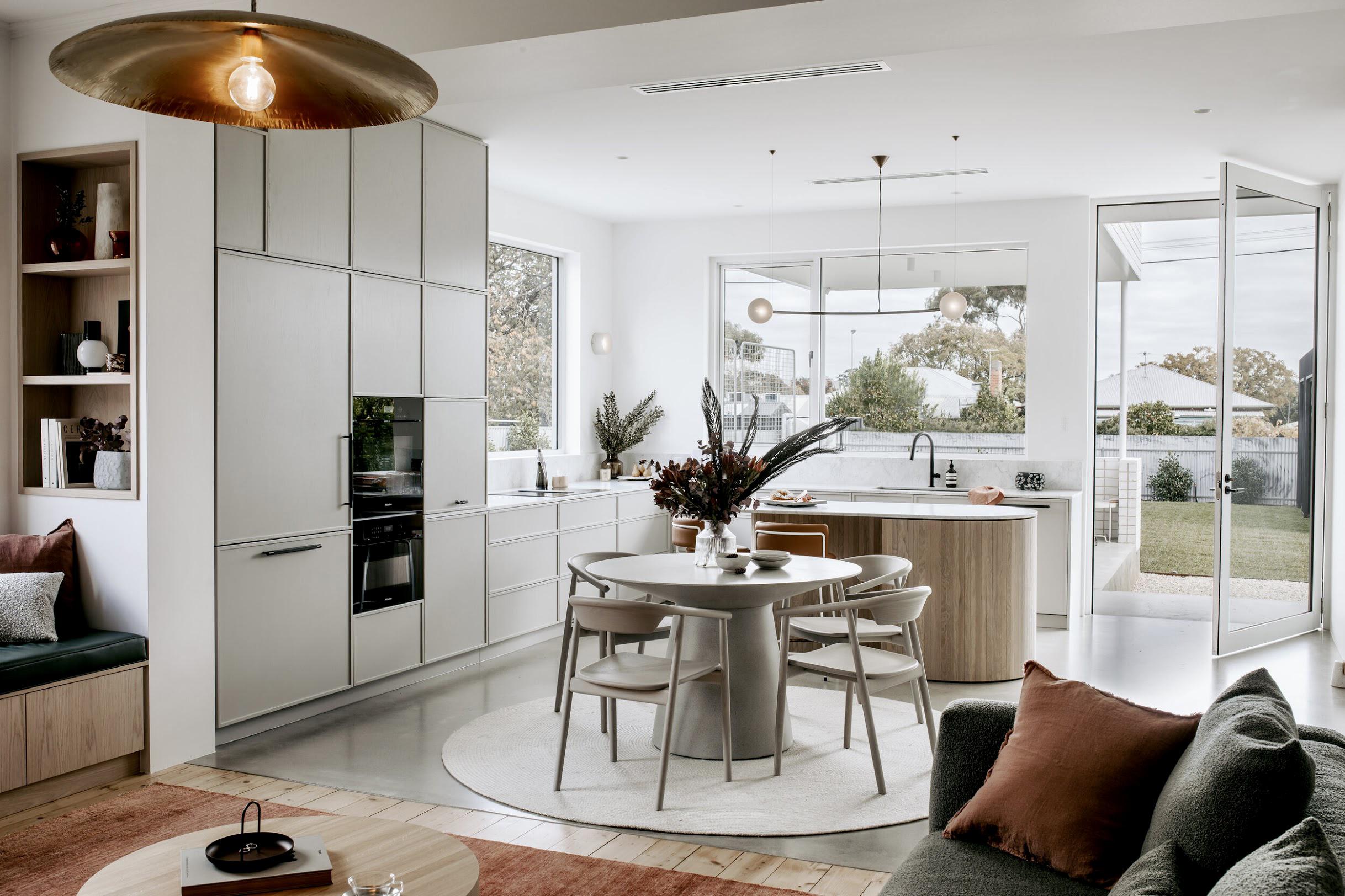 Open plan living and kitchen in a compact family bungalow, Adelaide ...