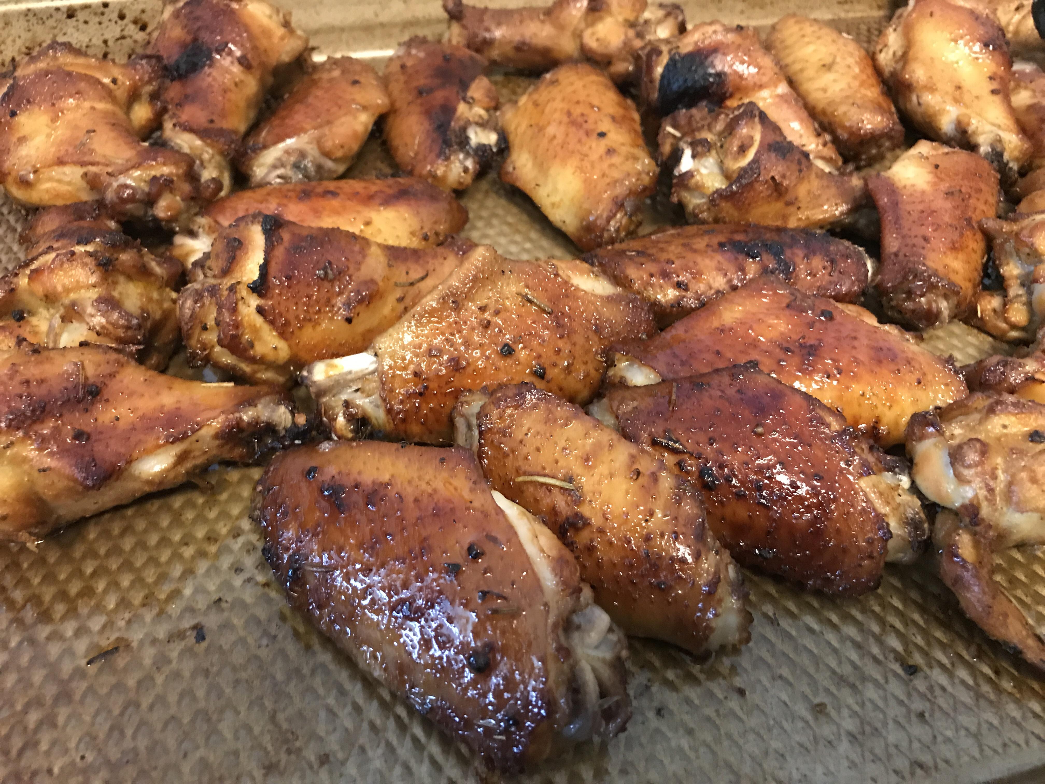 Pickle juice brined chicken wings, smoked and spicy. Dinner is served. Scrolller