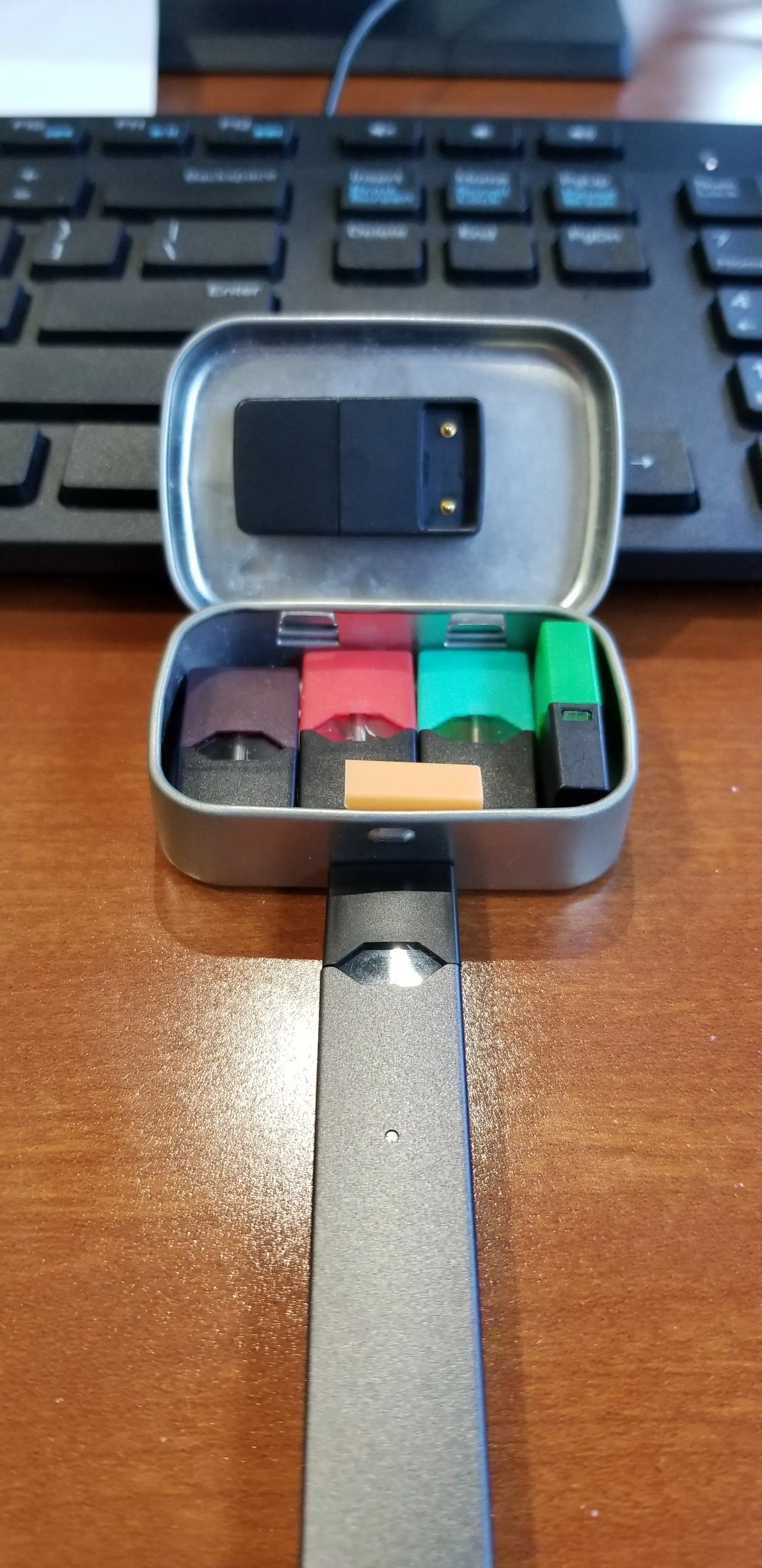 PSA: An Altoids mini tin perfectly fits four pods, and the chargers ...