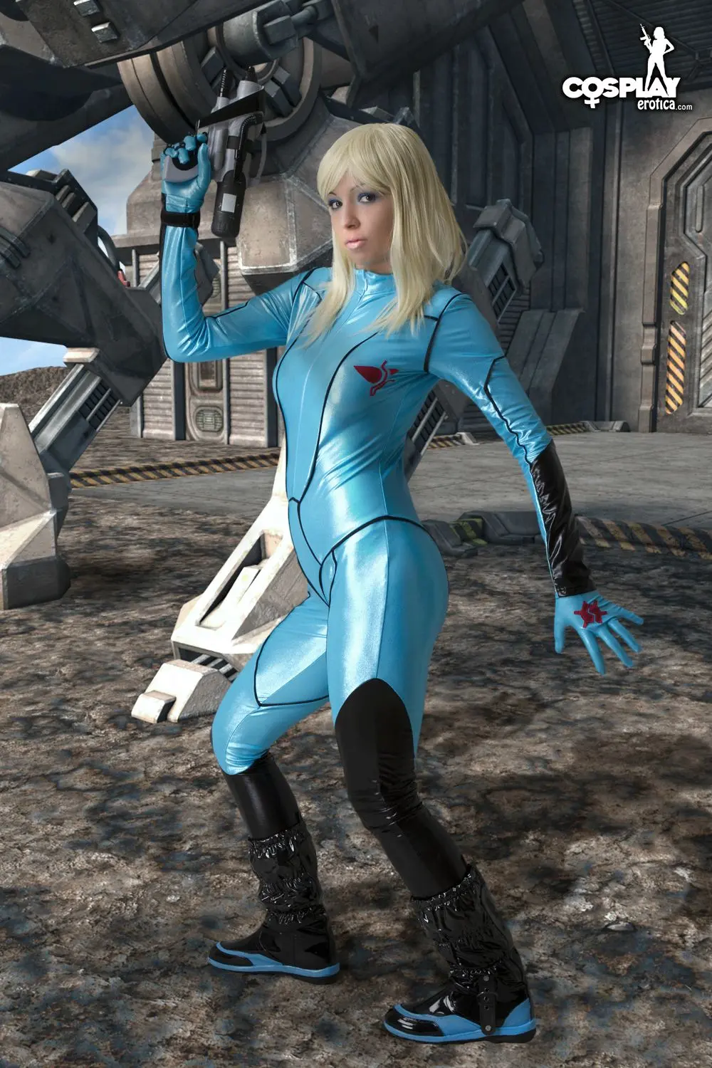 Mea Lee as Samus Aran from Metroid in a shiny blue bodysuit and black boots