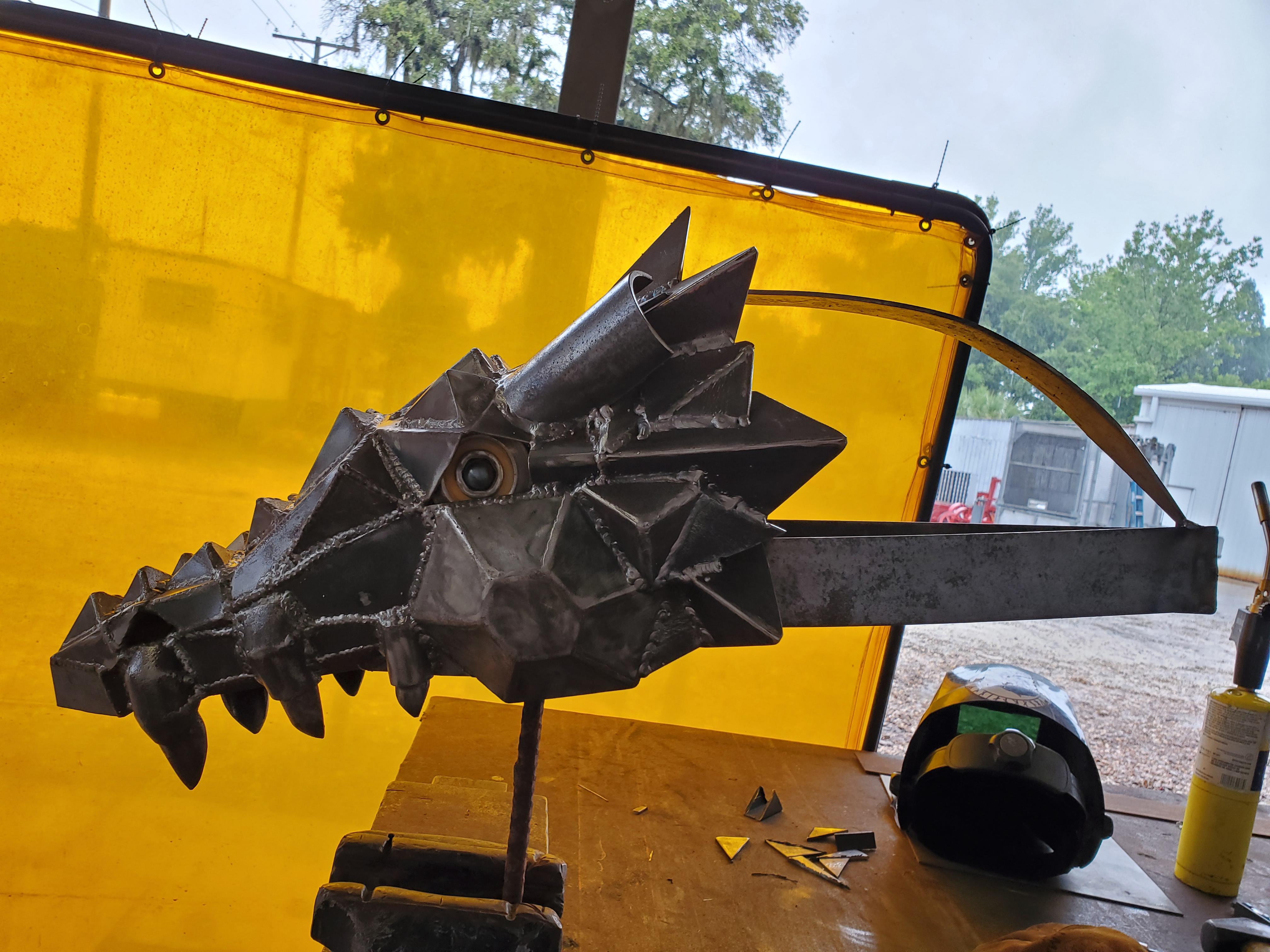 Steel dragon head sculpture, started as a side project, then imagination and inspiration took