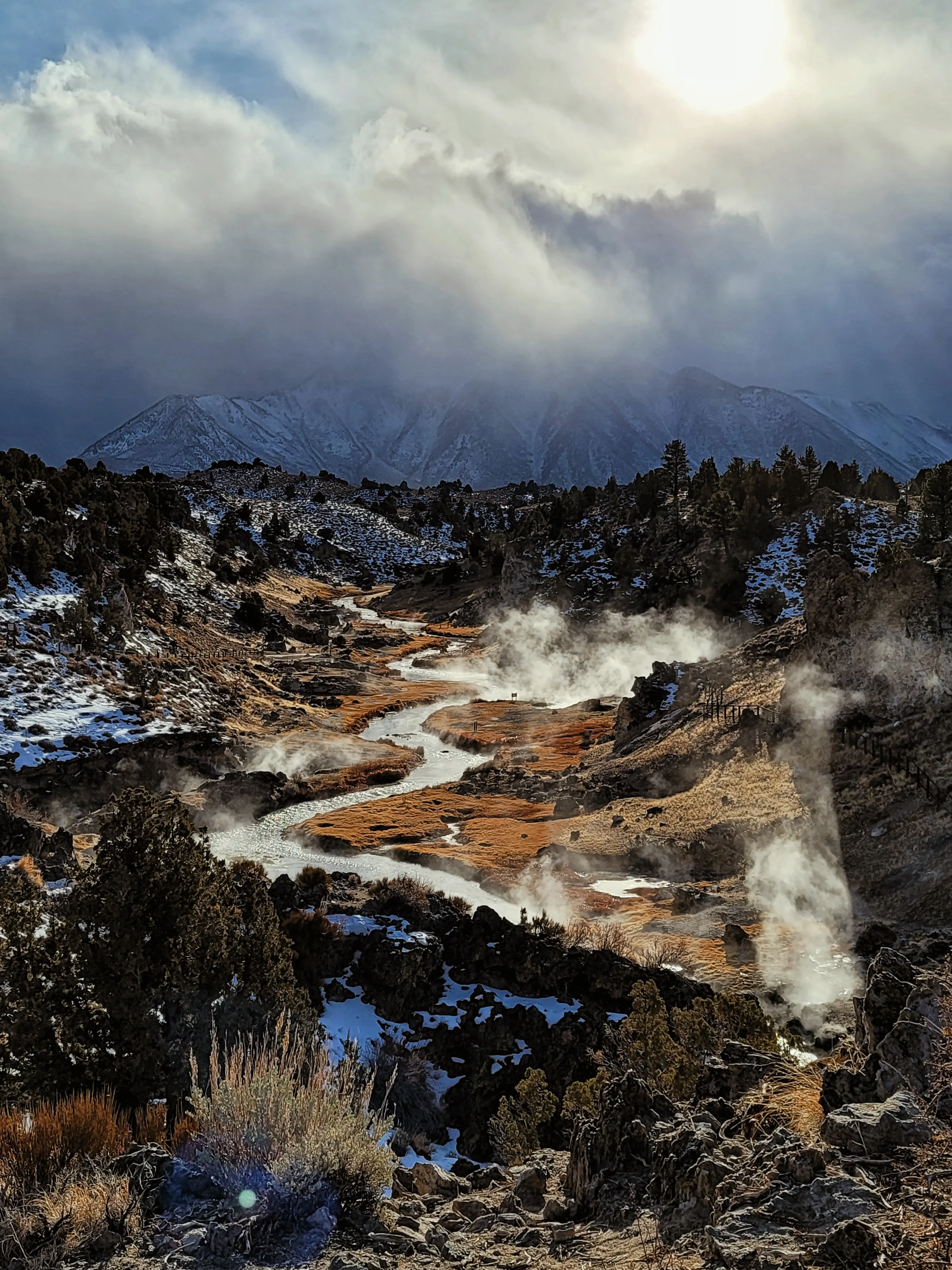 Sun's finally coming out after a storm. Hot Creek Geological Site ...