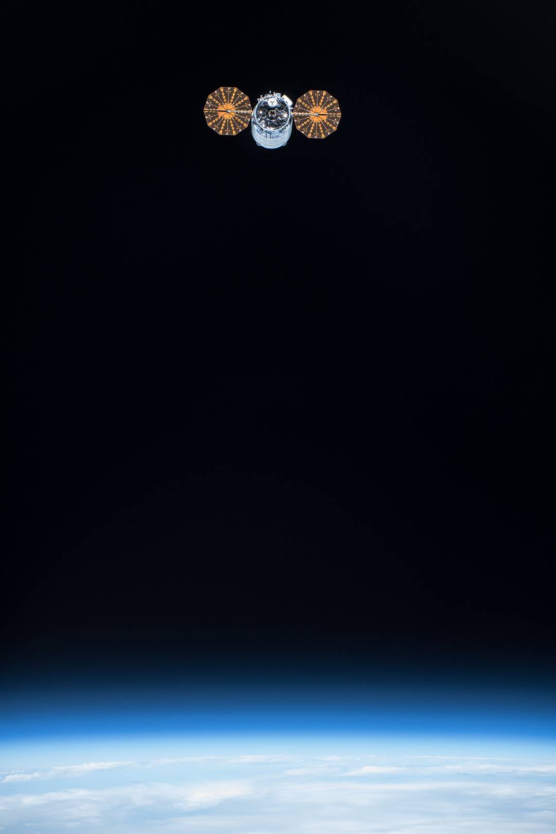 The Cygnus spacecraft with its cymbal-like UltraFlex solar arrays ...