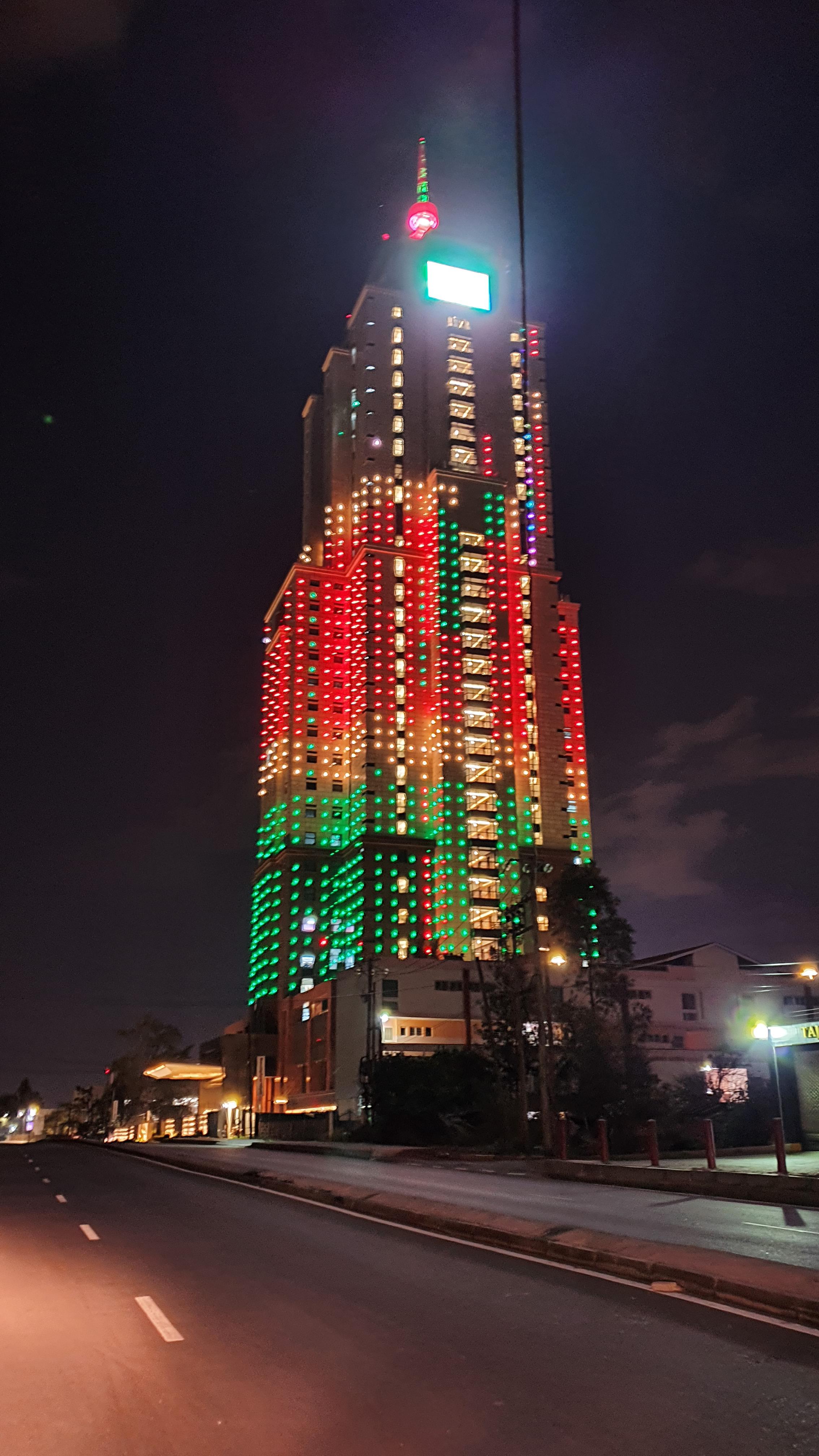 UAP Old Mutual Tower in Upper Hill glowing in the Kenyan flag colours