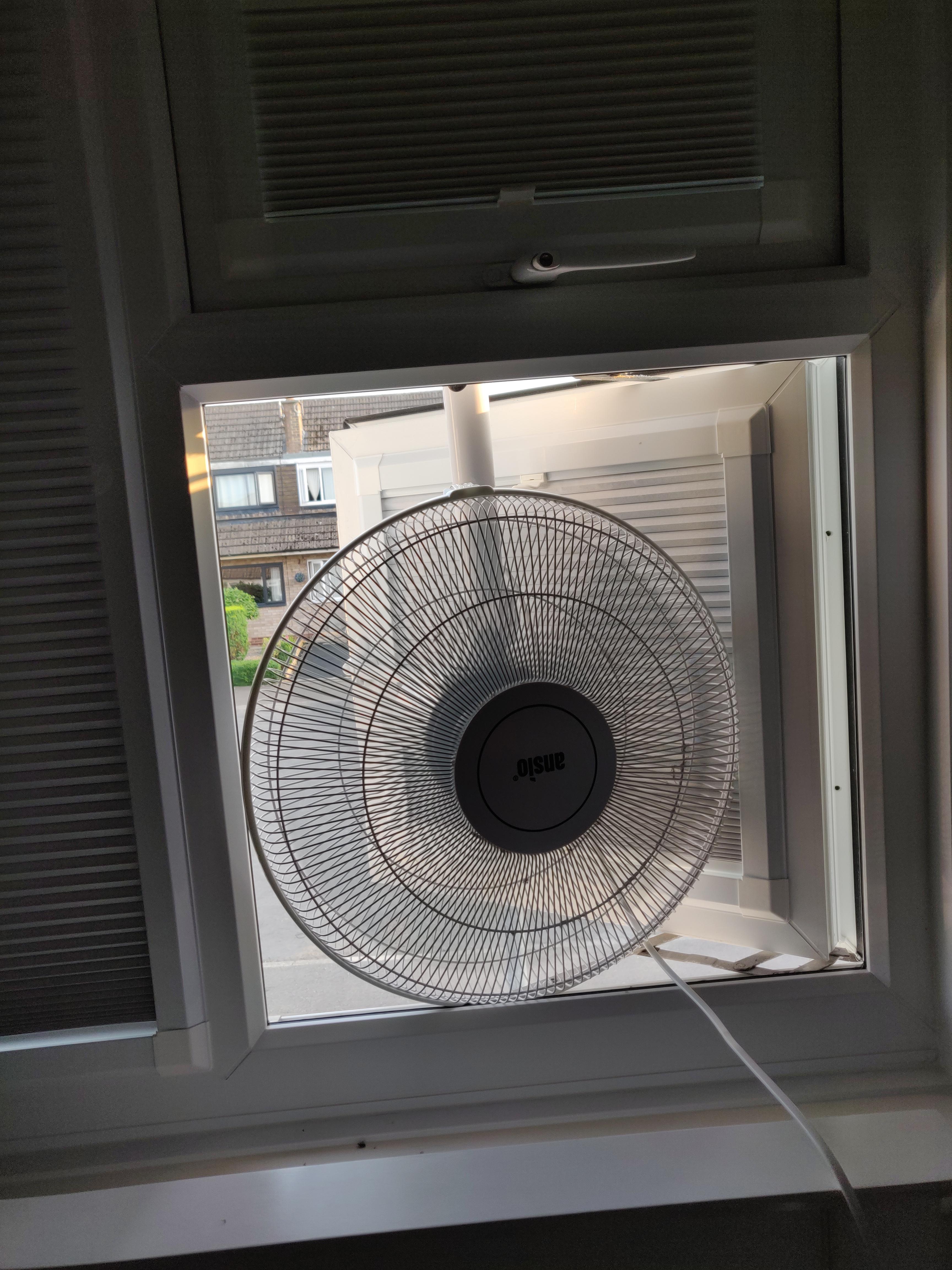 Wedge a fan in your open window and let it blast the cooler (~15 ...
