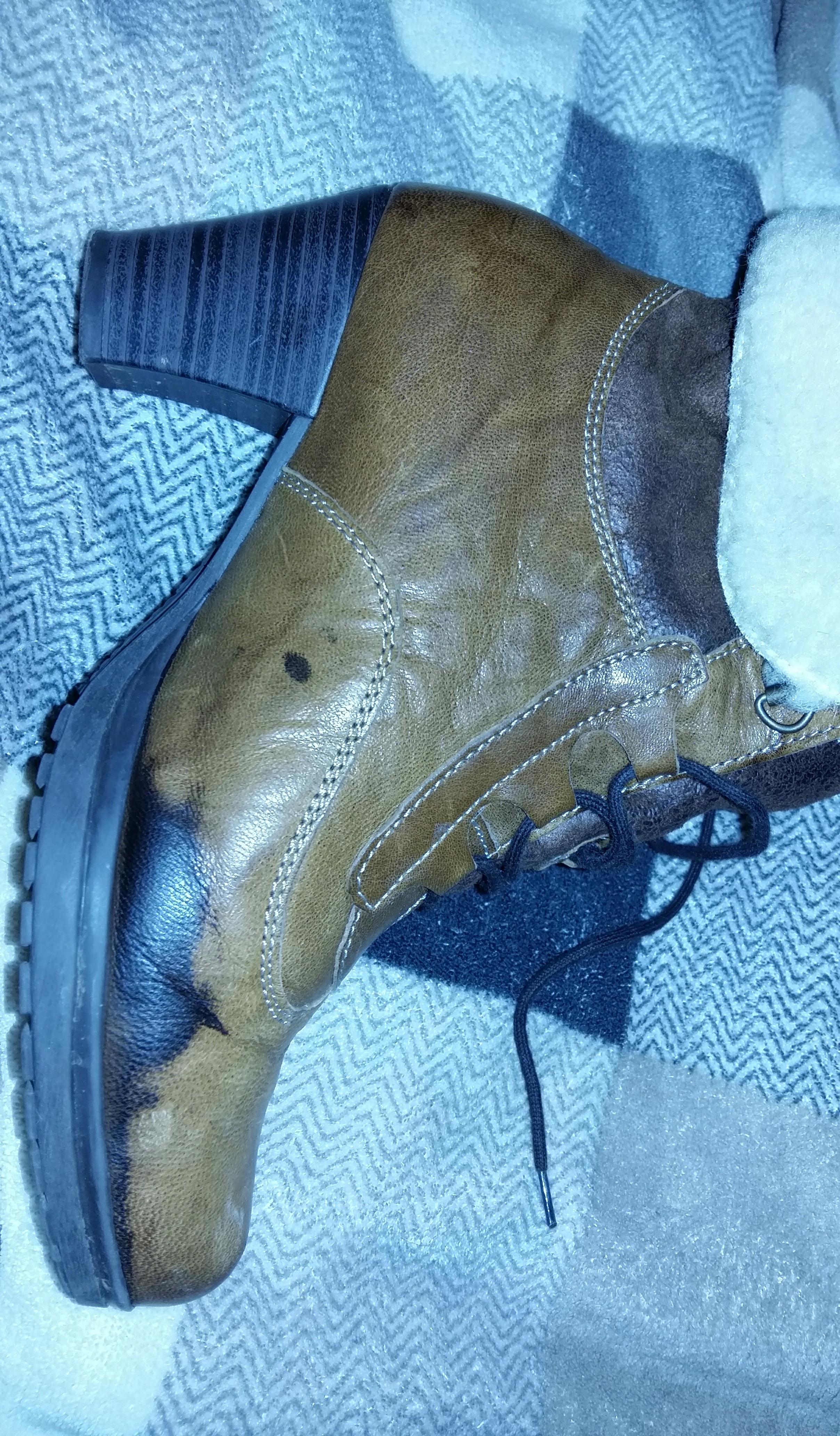 Why are my brown leather boots turning black? They were fine this