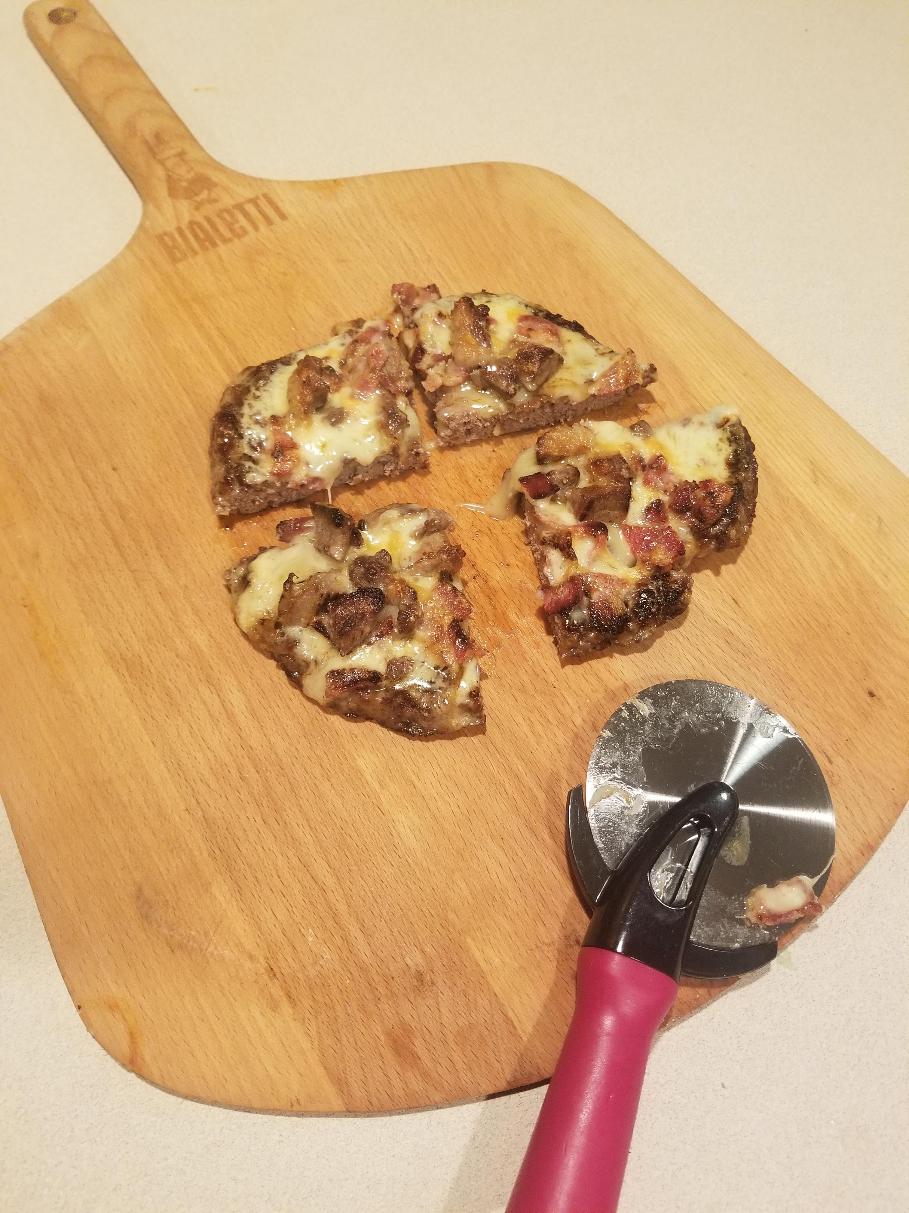 Zero carb pizza! 1lb Grass fed ground beef patty topped with raw