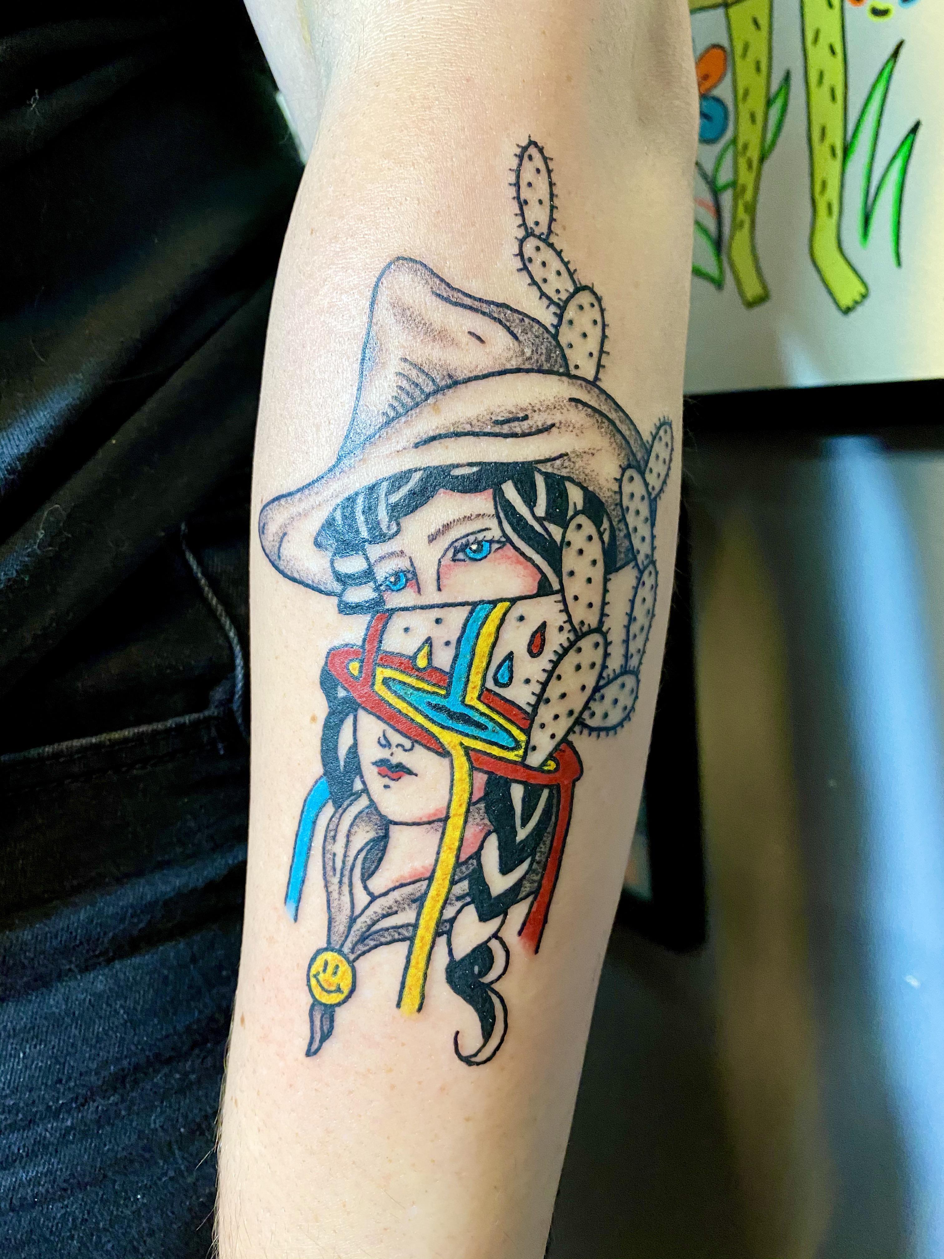A trippy cowgirl done by Deryk at electric hand tattoo in Nashville Scrolller