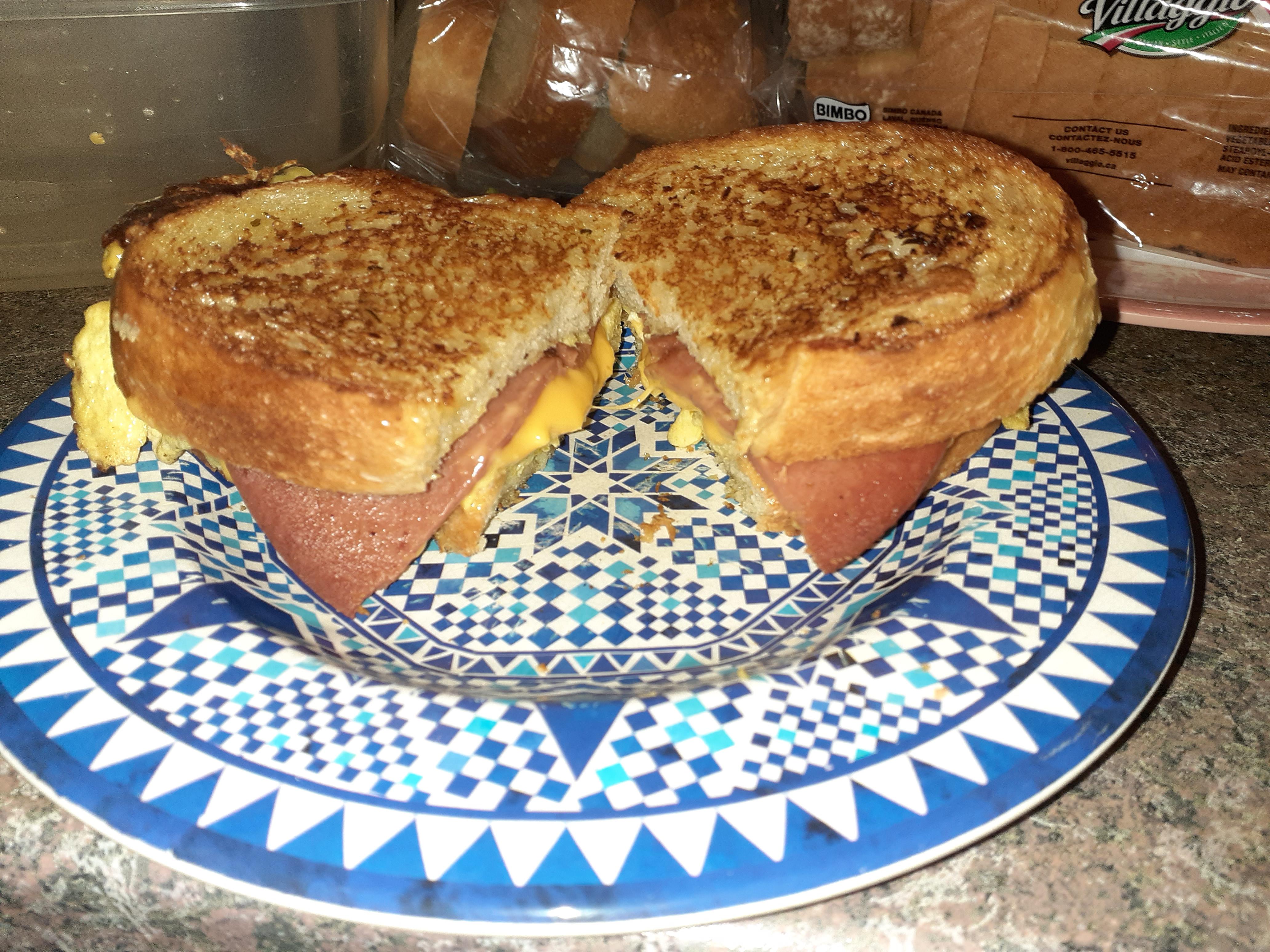 Bacon is expensive. Fry bologna instead, with egg and cheese, on one