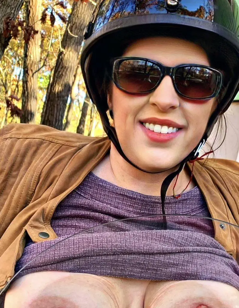 Biker chick flashing.