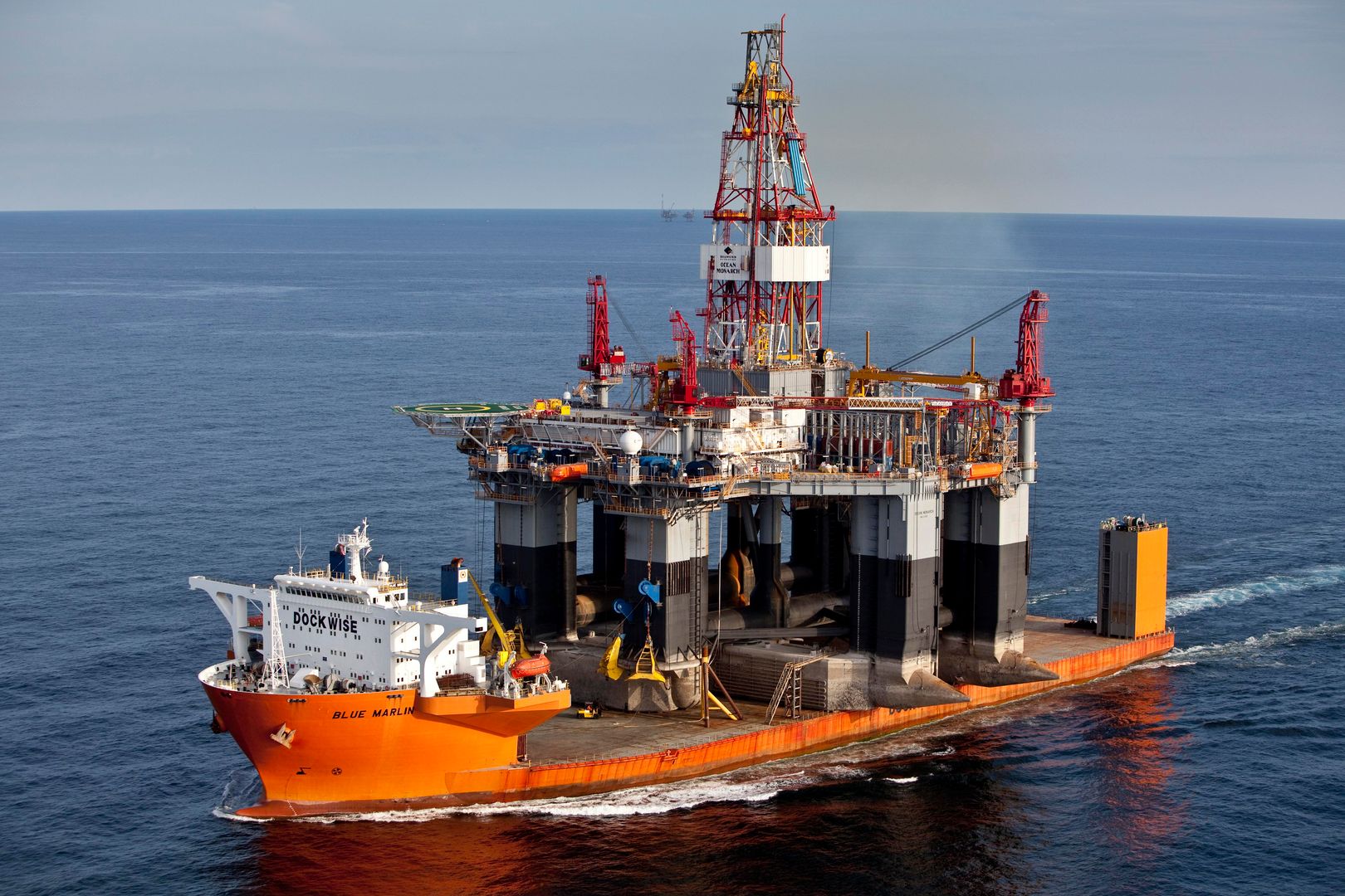 Blue Marlin, semi-submerging heavy lift ship... carrying an oil rig ...