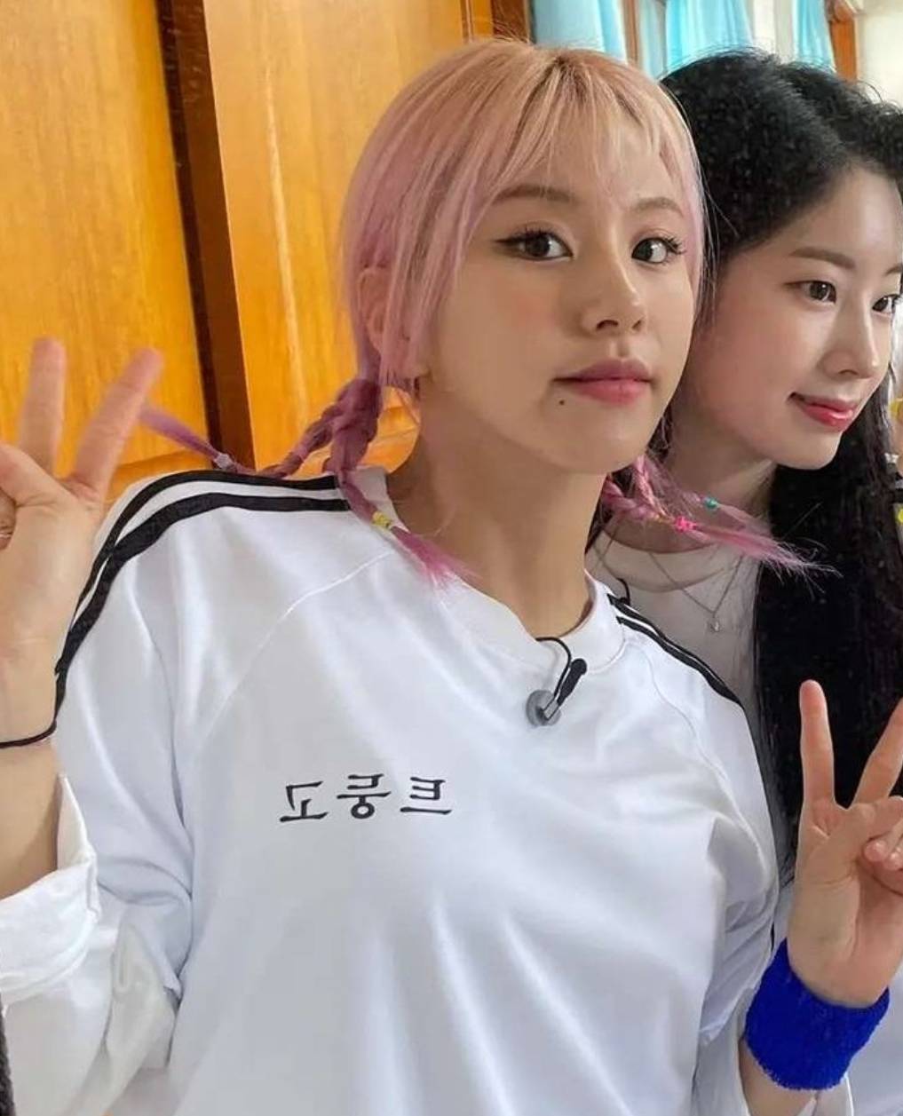 Chaeyoung (ft. Dahyun) - pink braided pigtails, white shirt | Scrolller