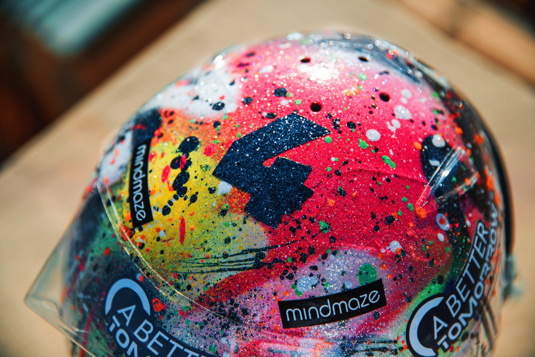 Closeup top angle of Lando's helmet for the Abu Dhabi GP. More photos