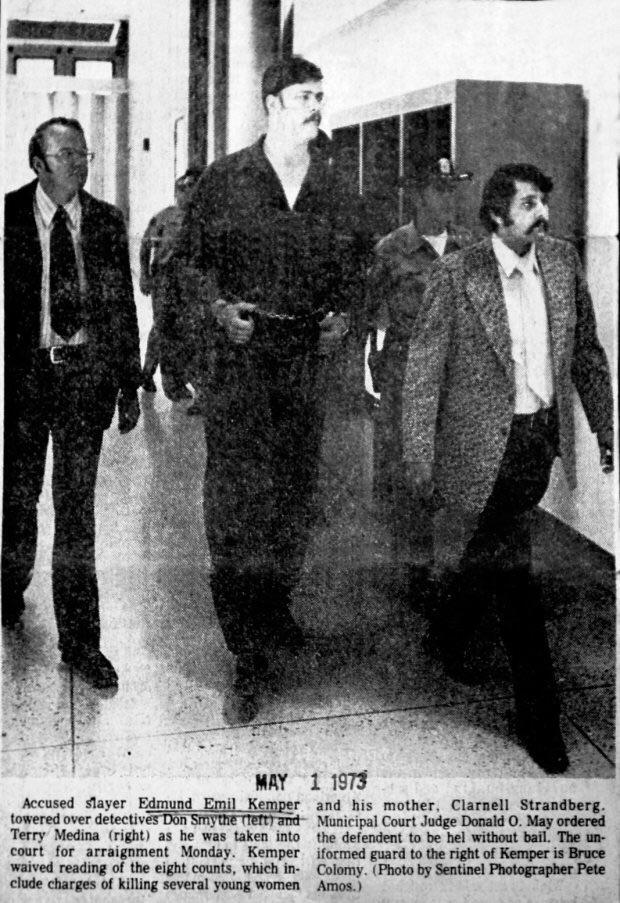 Coed Killer Edmund Kemper towering over law enforcement as they escort ...