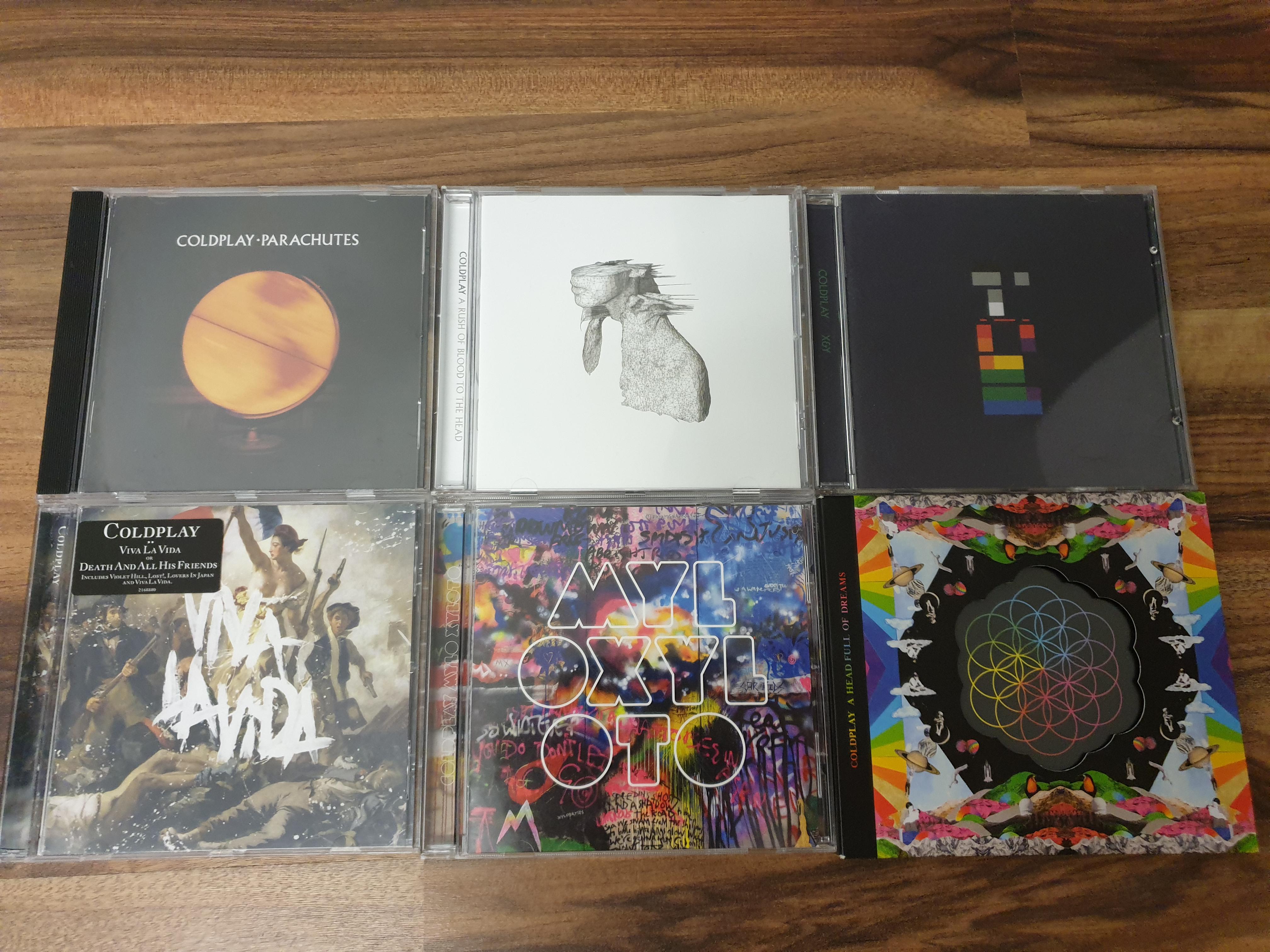 Coldplay's CD collection so far | Scrolller