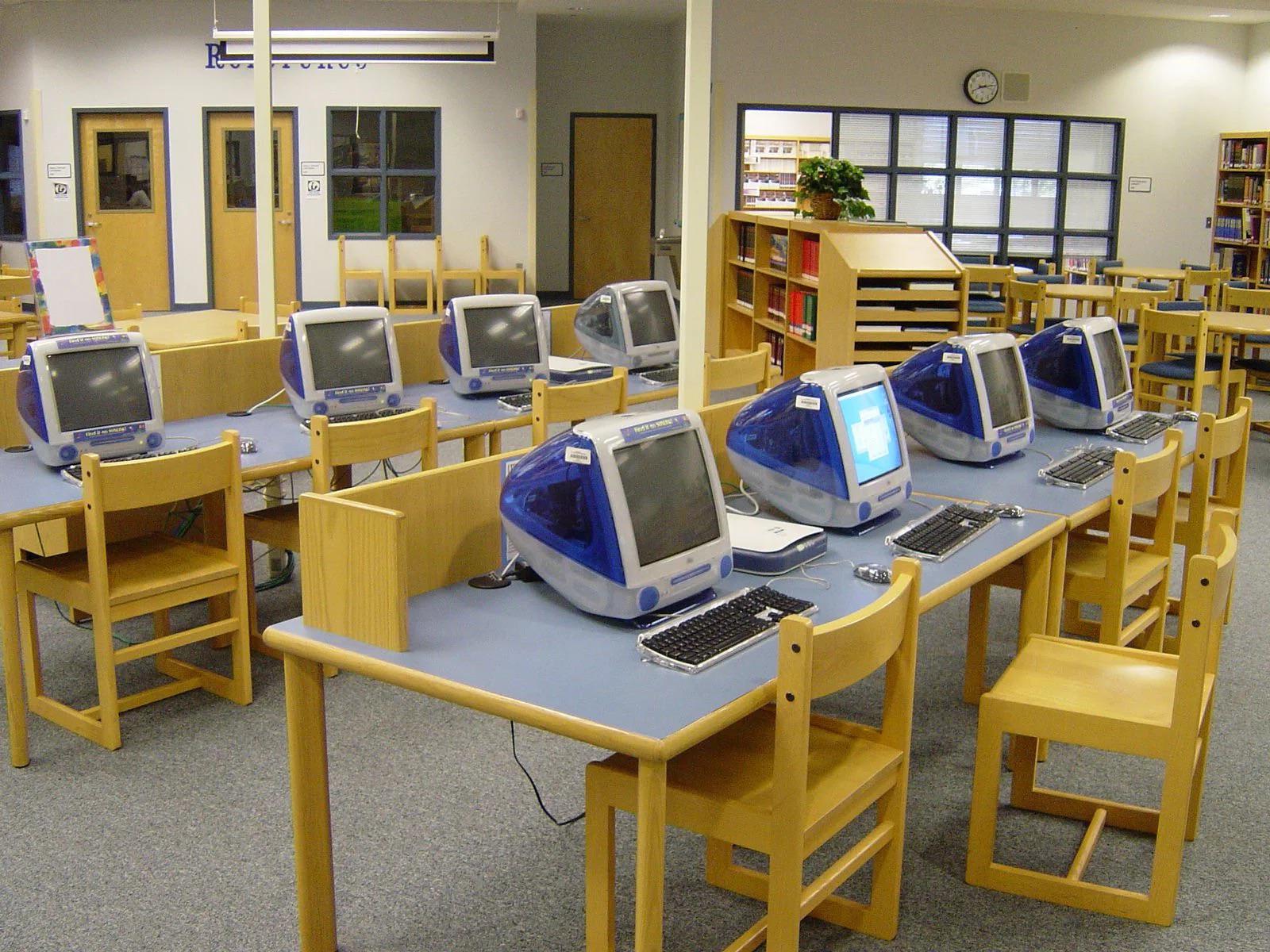 Computer Lab Class. Playing typing games and putting a sheet of paper ...