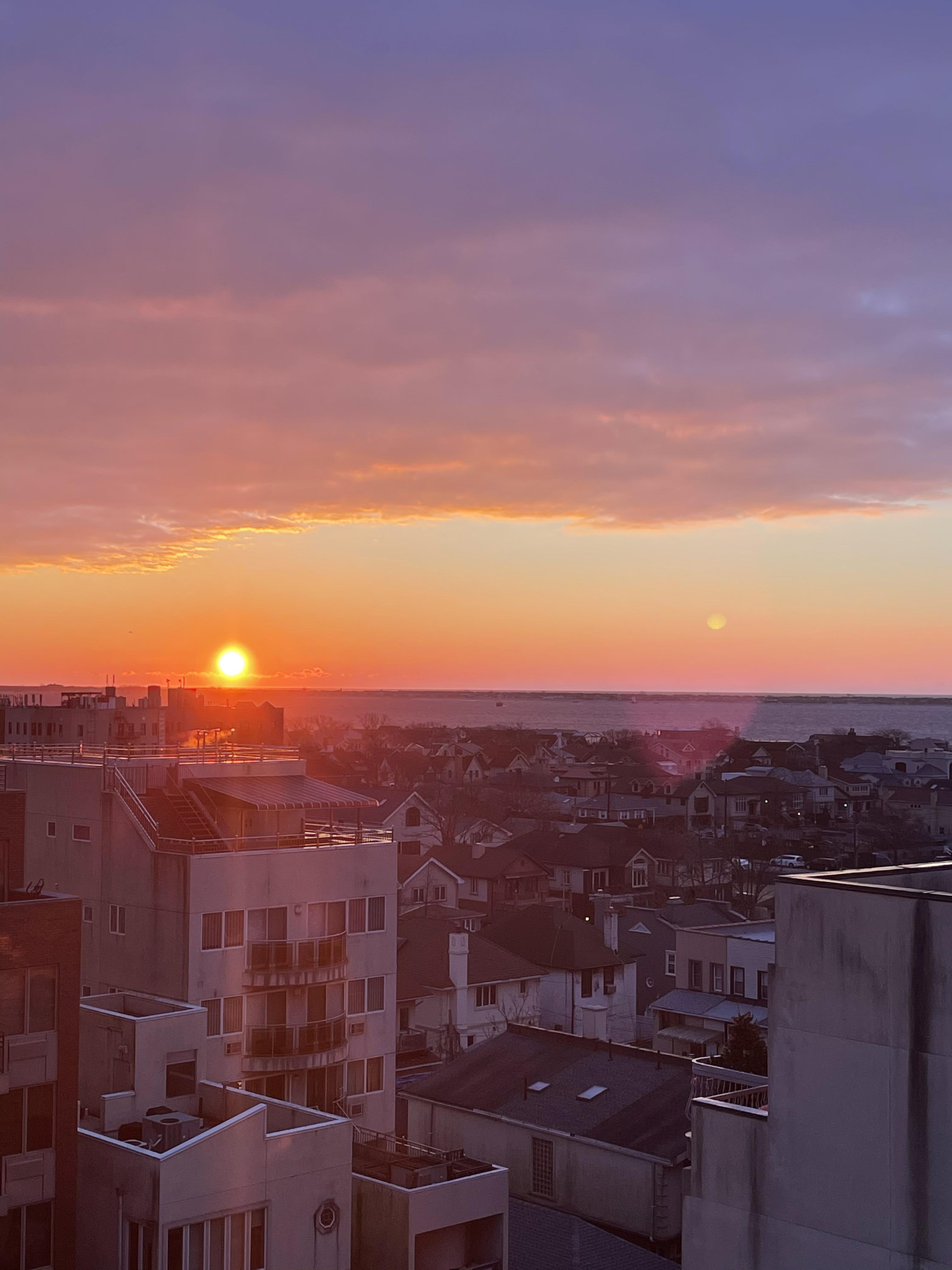Cotton candy cloud moving over for the sunrise Scrolller