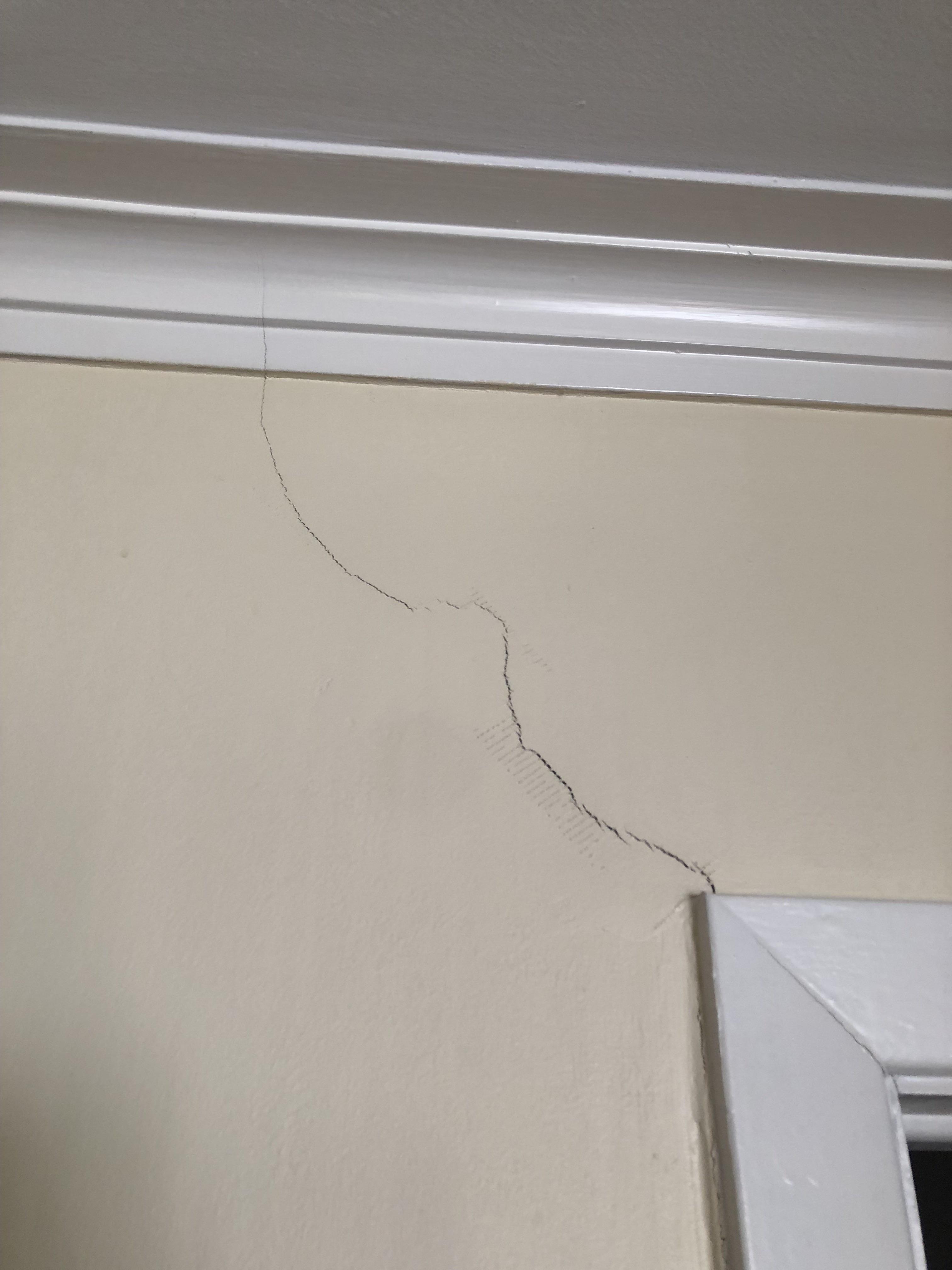 Cracks above the door frames, sticking doors and slanted floors...cause ...