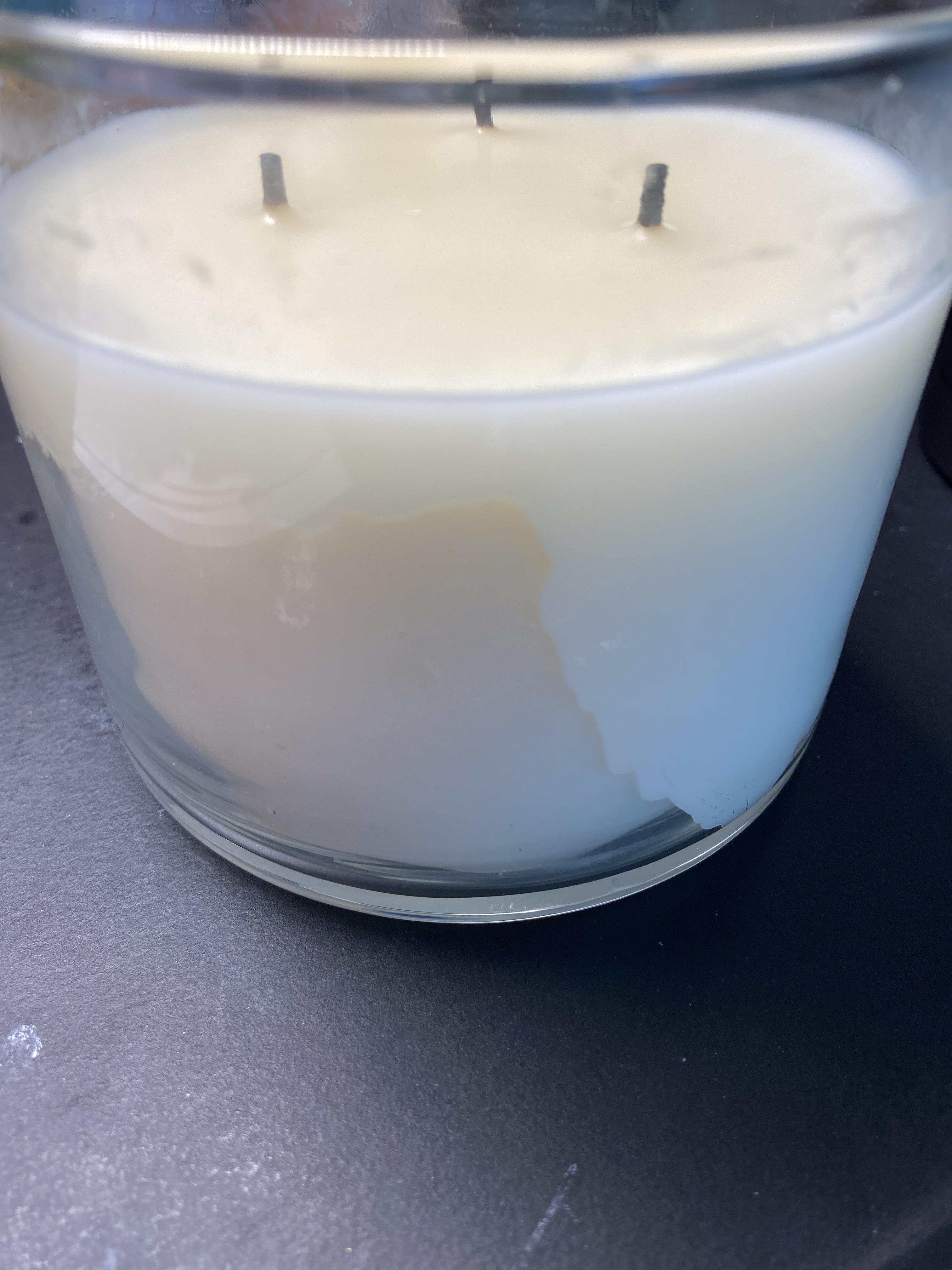Does anyone know why the wax of my candle is doing this, and how to fix