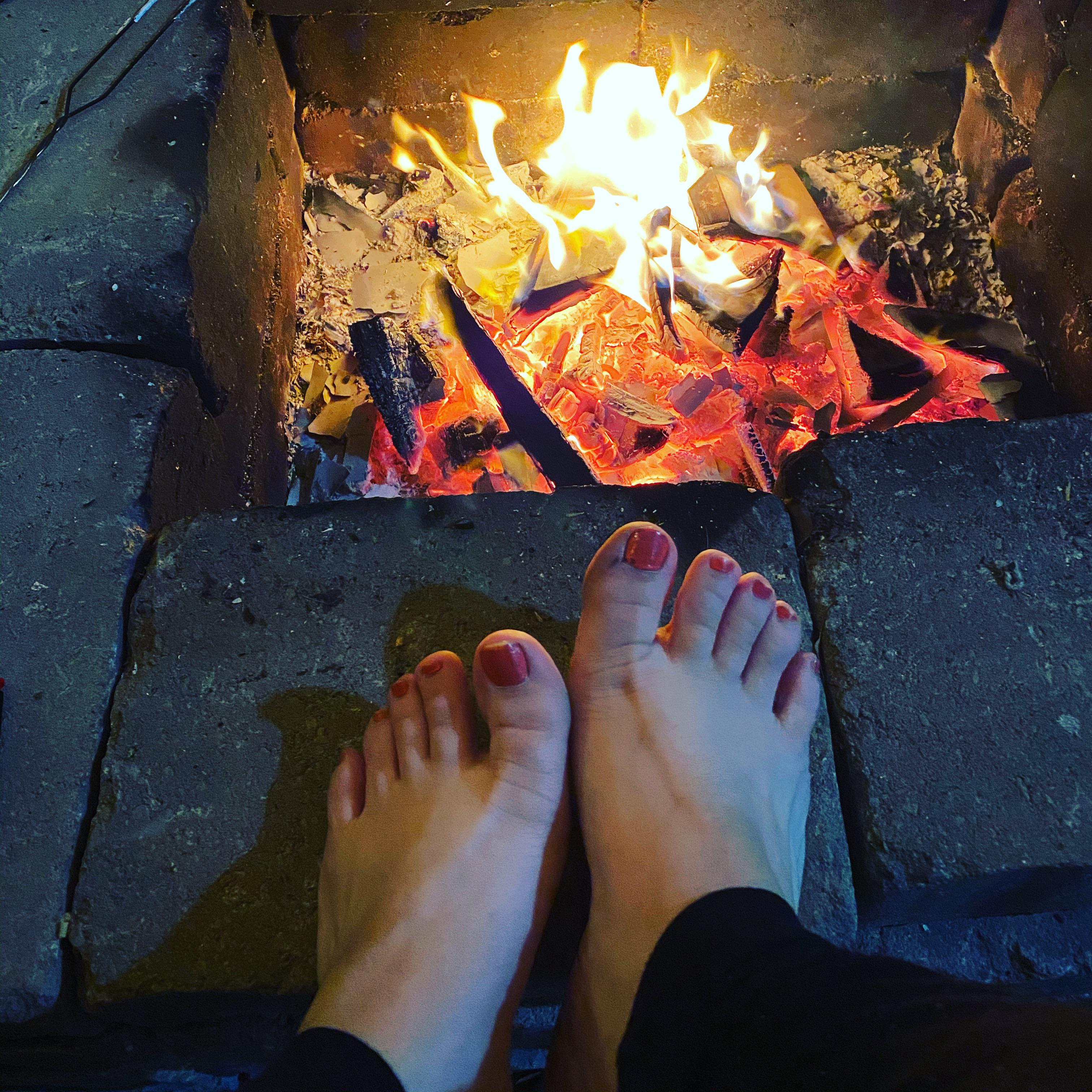 Feet near the fire 🔥 | Scrolller
