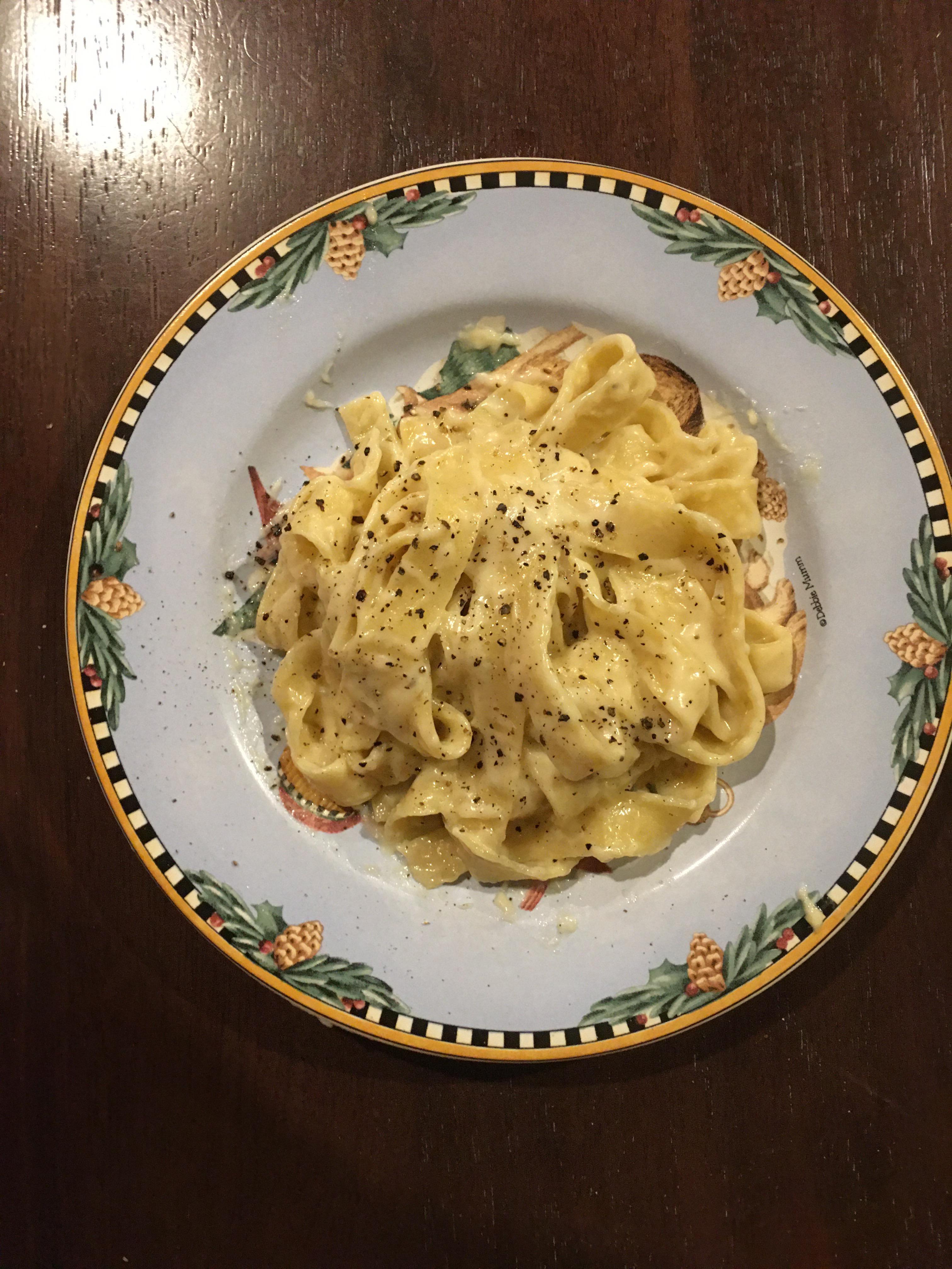 Fettuccine Alfredo from scratch made entirely by hand. Scrolller