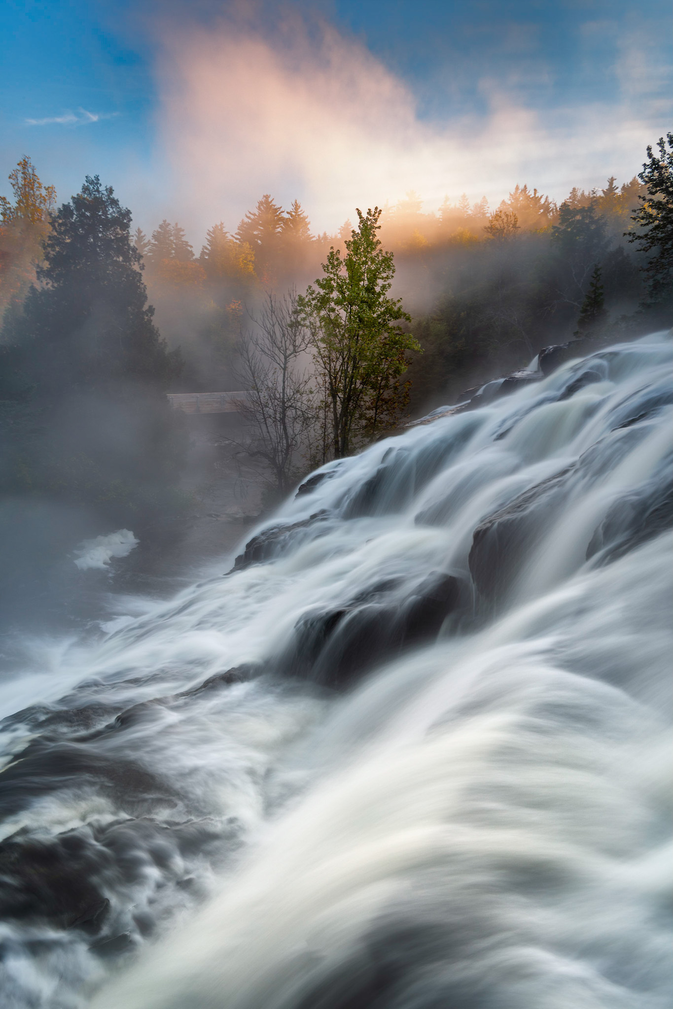 Ghost Mist - Mist flows above a waterfall on a cool morning. | Scrolller